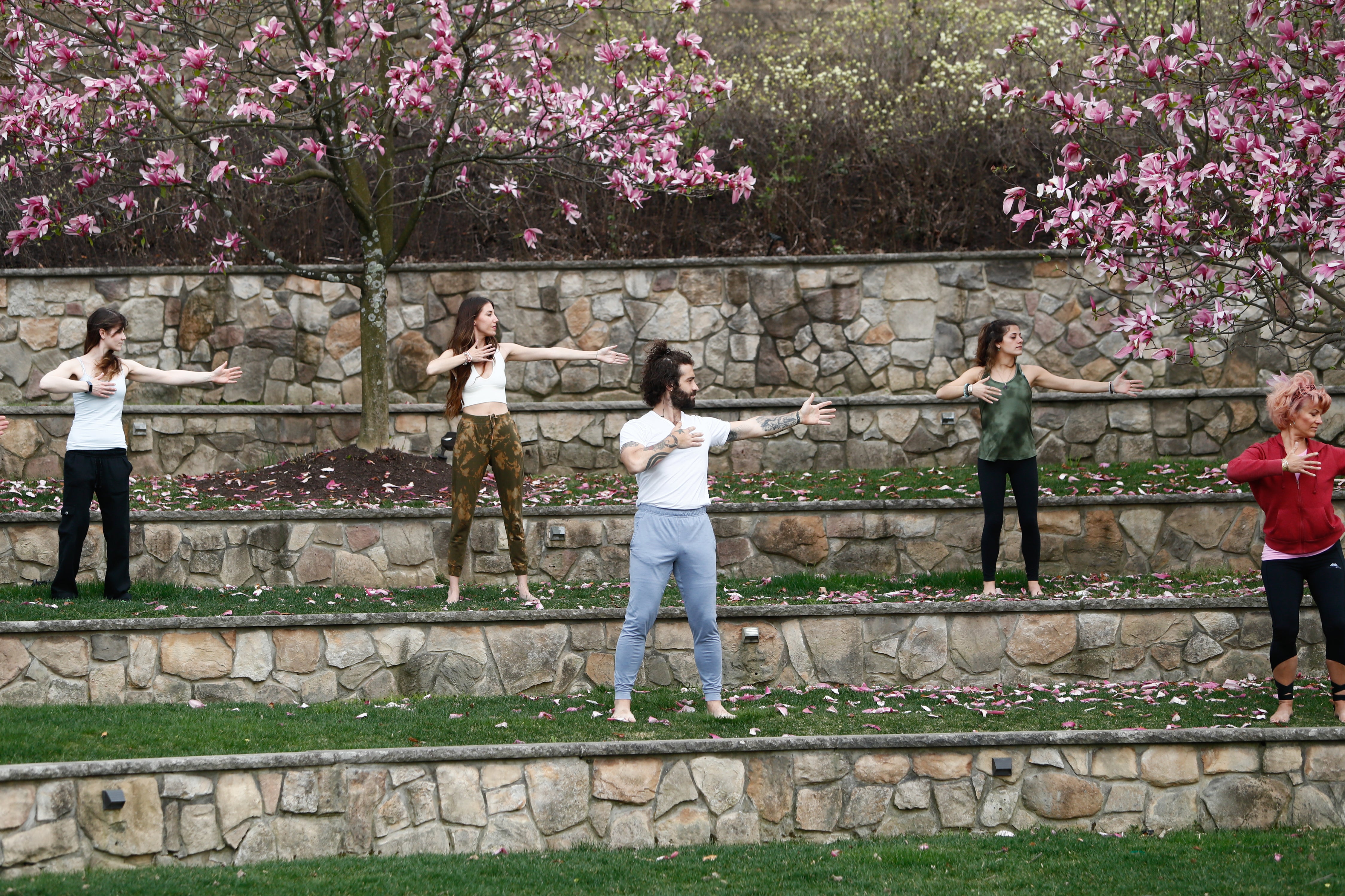 Group Qi Gong Meditation in the ampitheater at Grand Cascades Lodge at Crystal Springs Resort