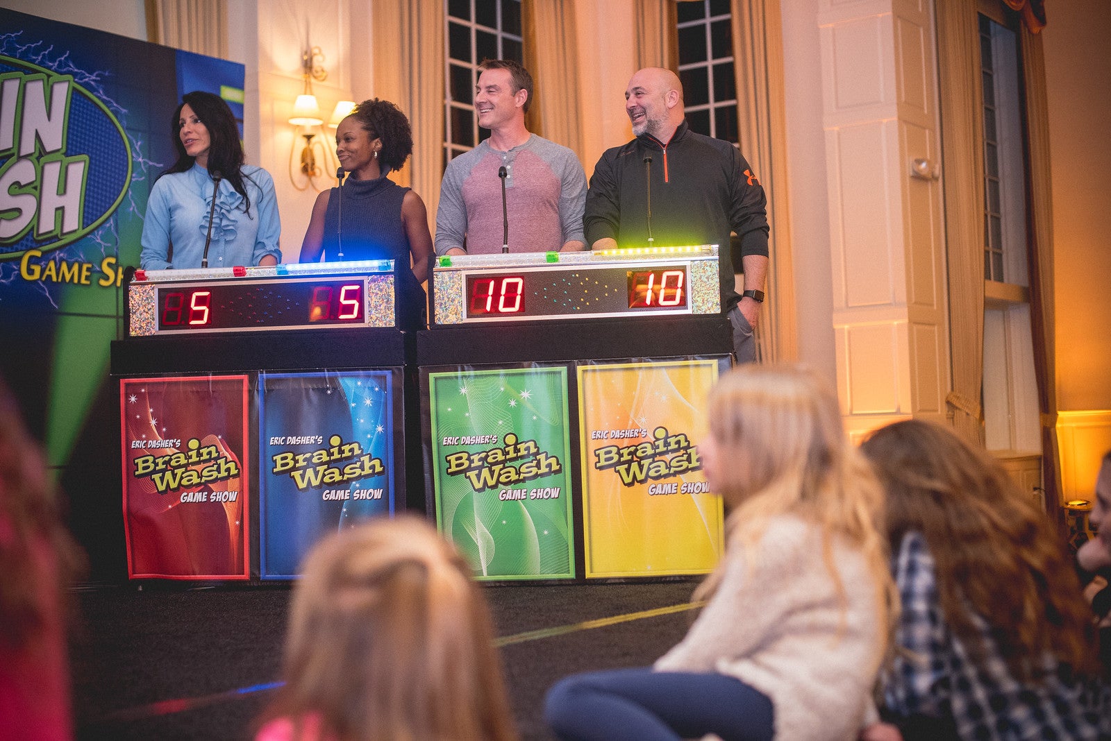 A group participating in an interactive game show