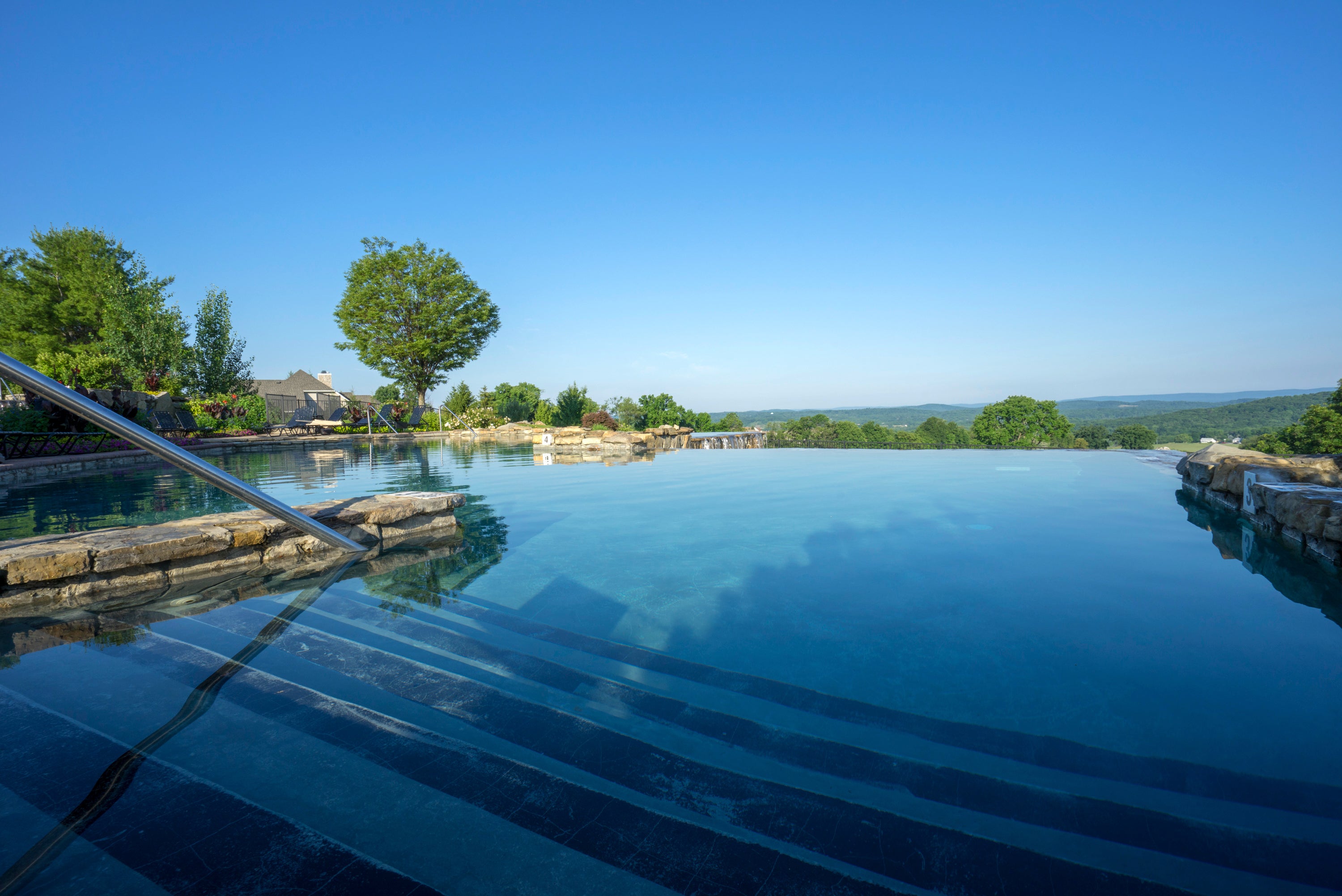 Stairs walking into vista 180 pool.