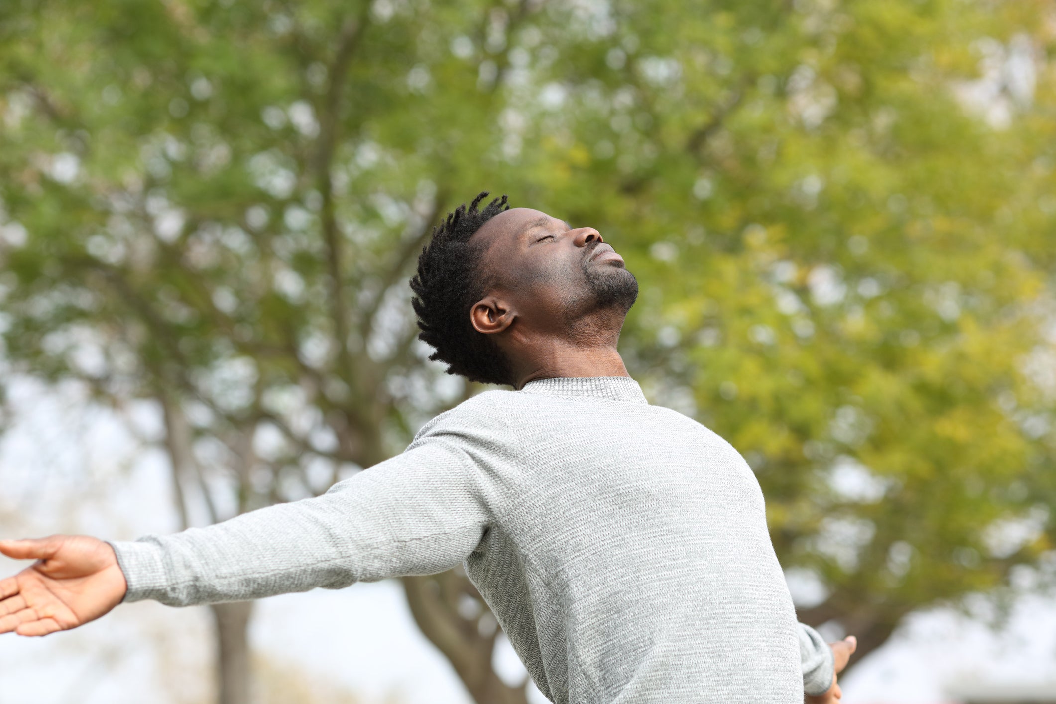 Man participating in a mindfulness practice outdoors
