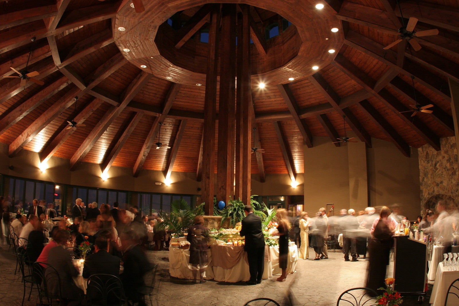 Guests dressed formal for an evening event in the Rotunda at Crystal Springs Resort