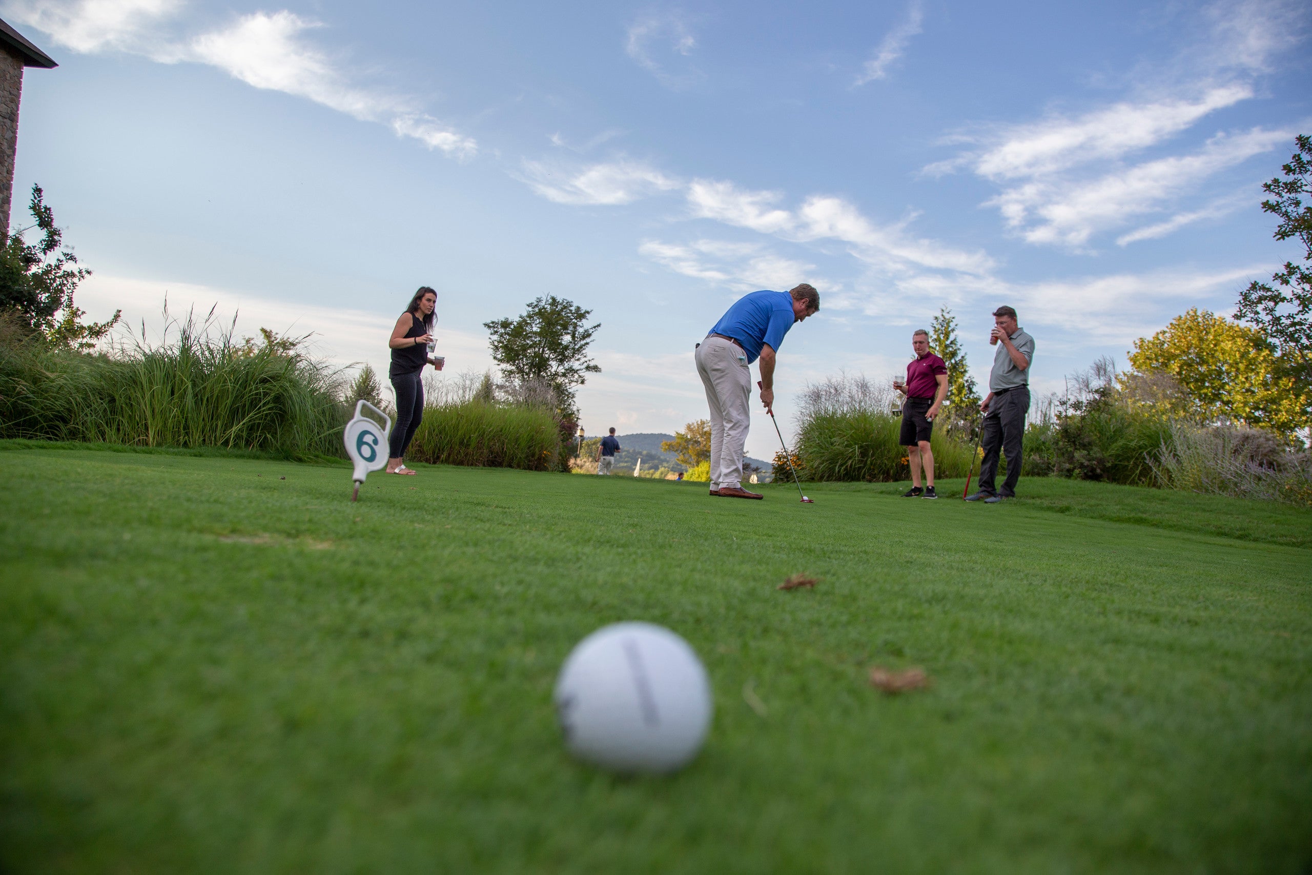 Group Playing Mini Golf at a resort close to NYC