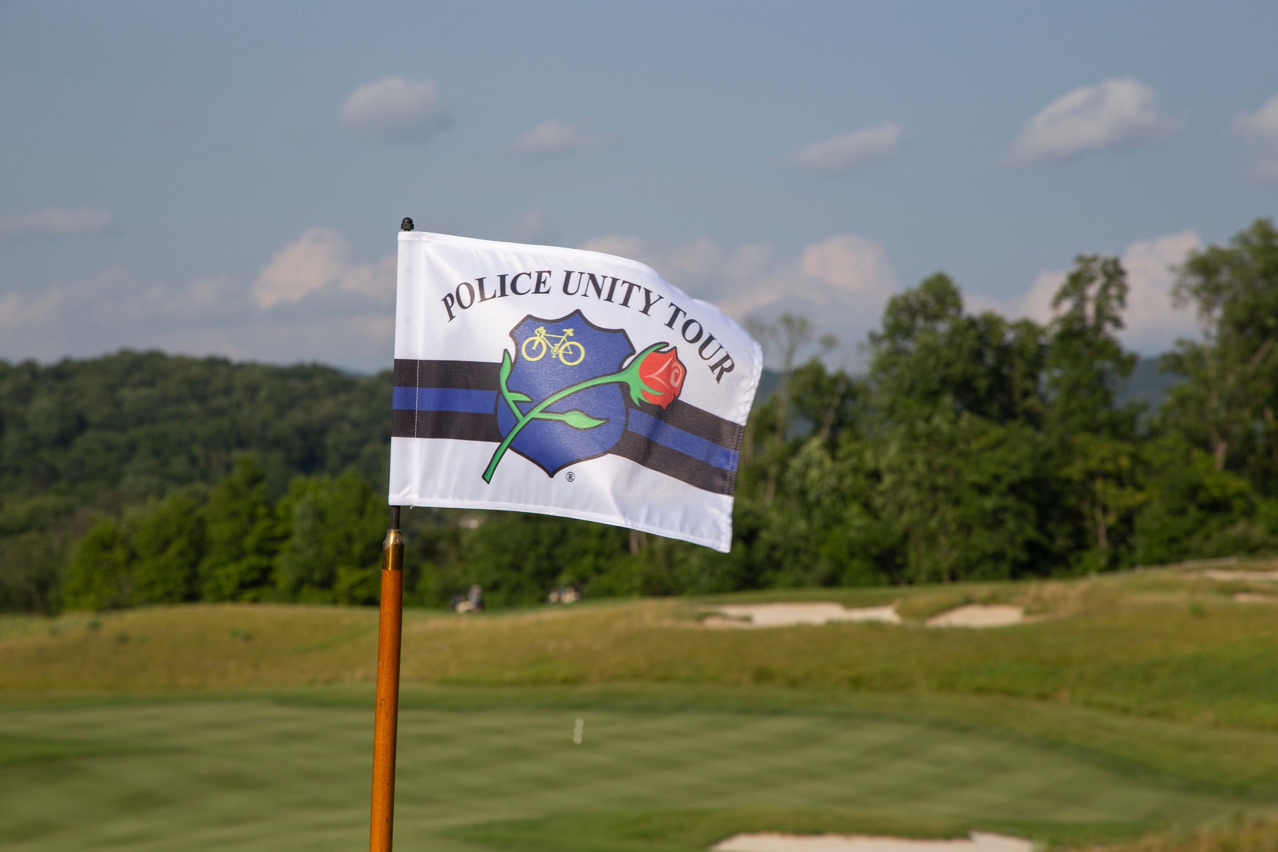 Police Unity Tour golf course flag