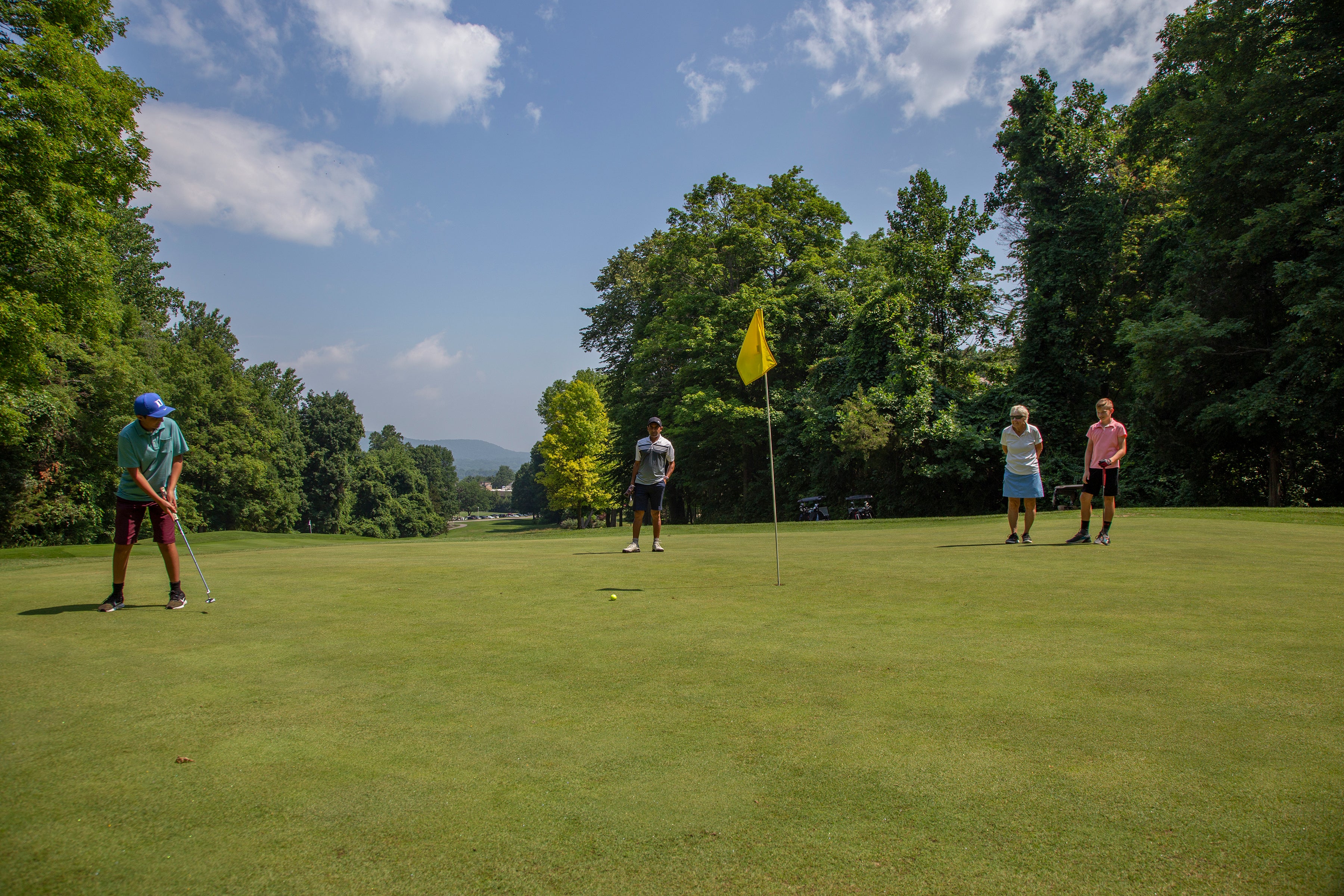 A family golfing at a family friendly resort near NYC