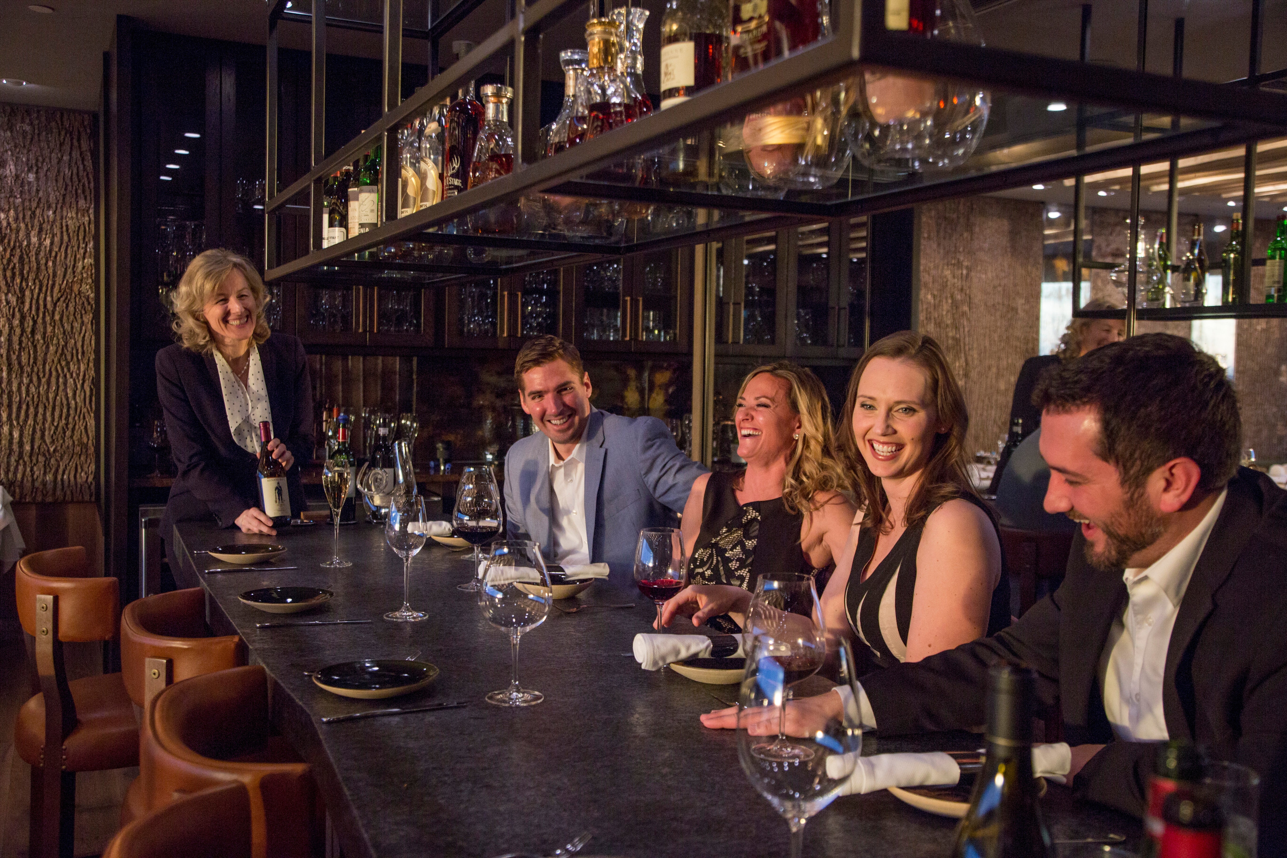 Group of friends enjoying dinner at Restaurant Latour.