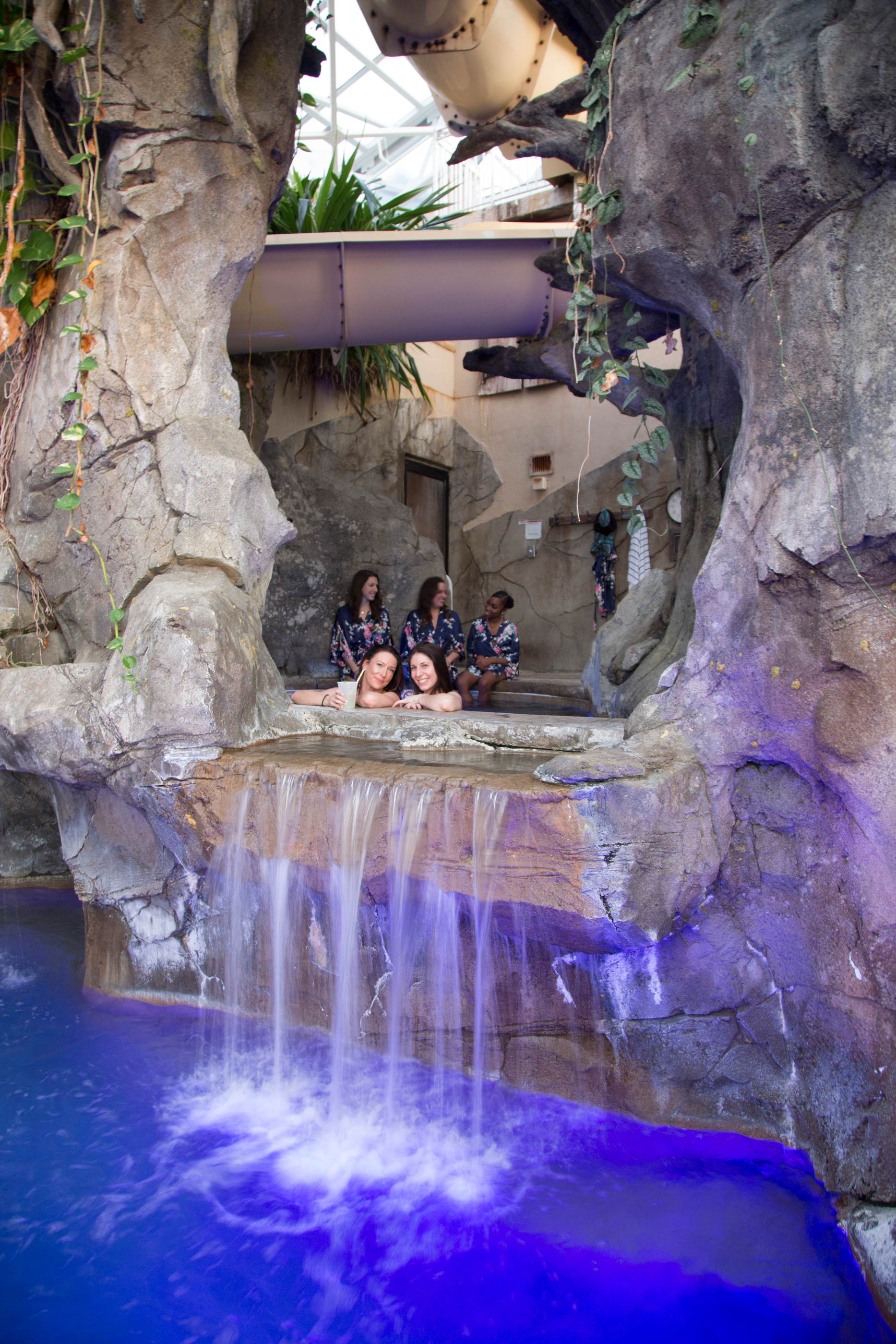 Girlfriends in hot tub at Biosphere pool complex.