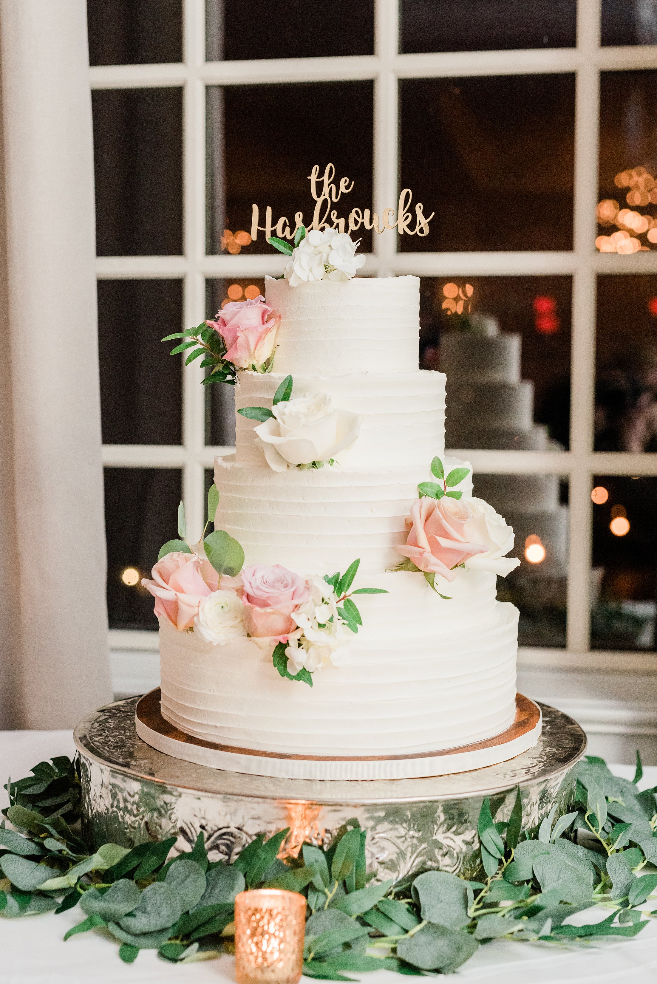 Beautiful wedding cake with pink and white roses