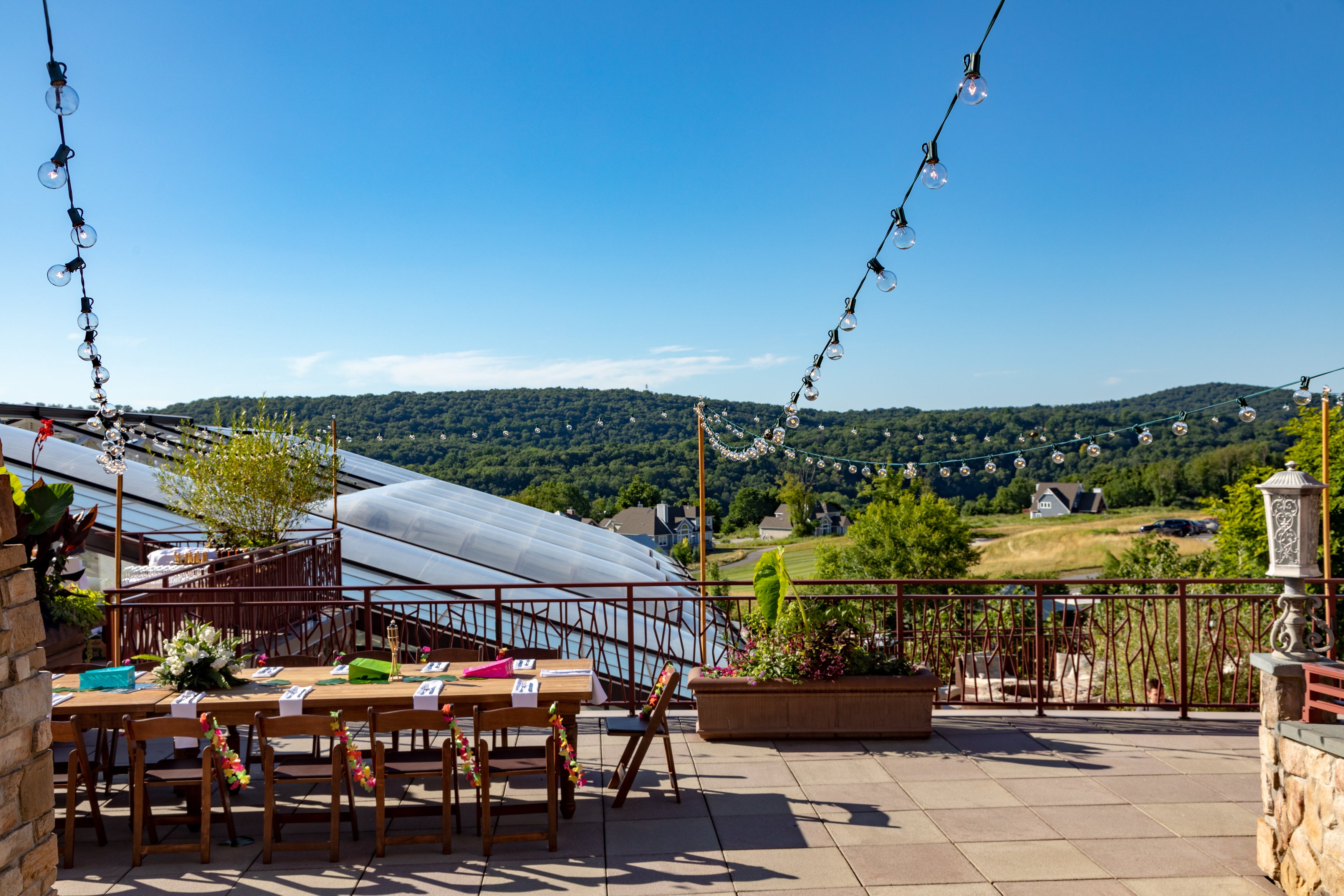 An event set up on the terrace overlooking a view from Crystal Springs Resort