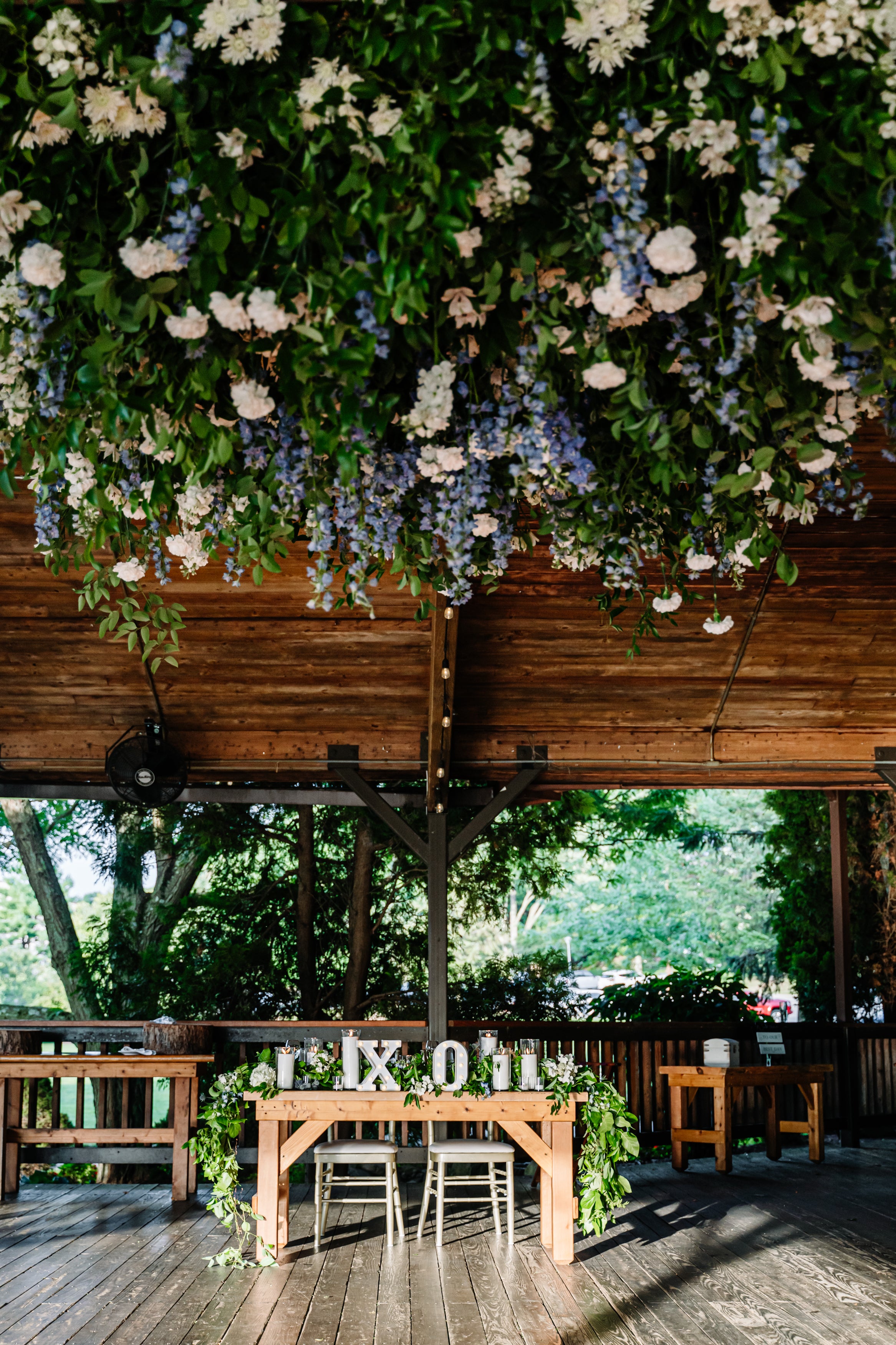 &quot;XO&quot; sweetheart table at wedding reception at Sweetgrass Pavilion