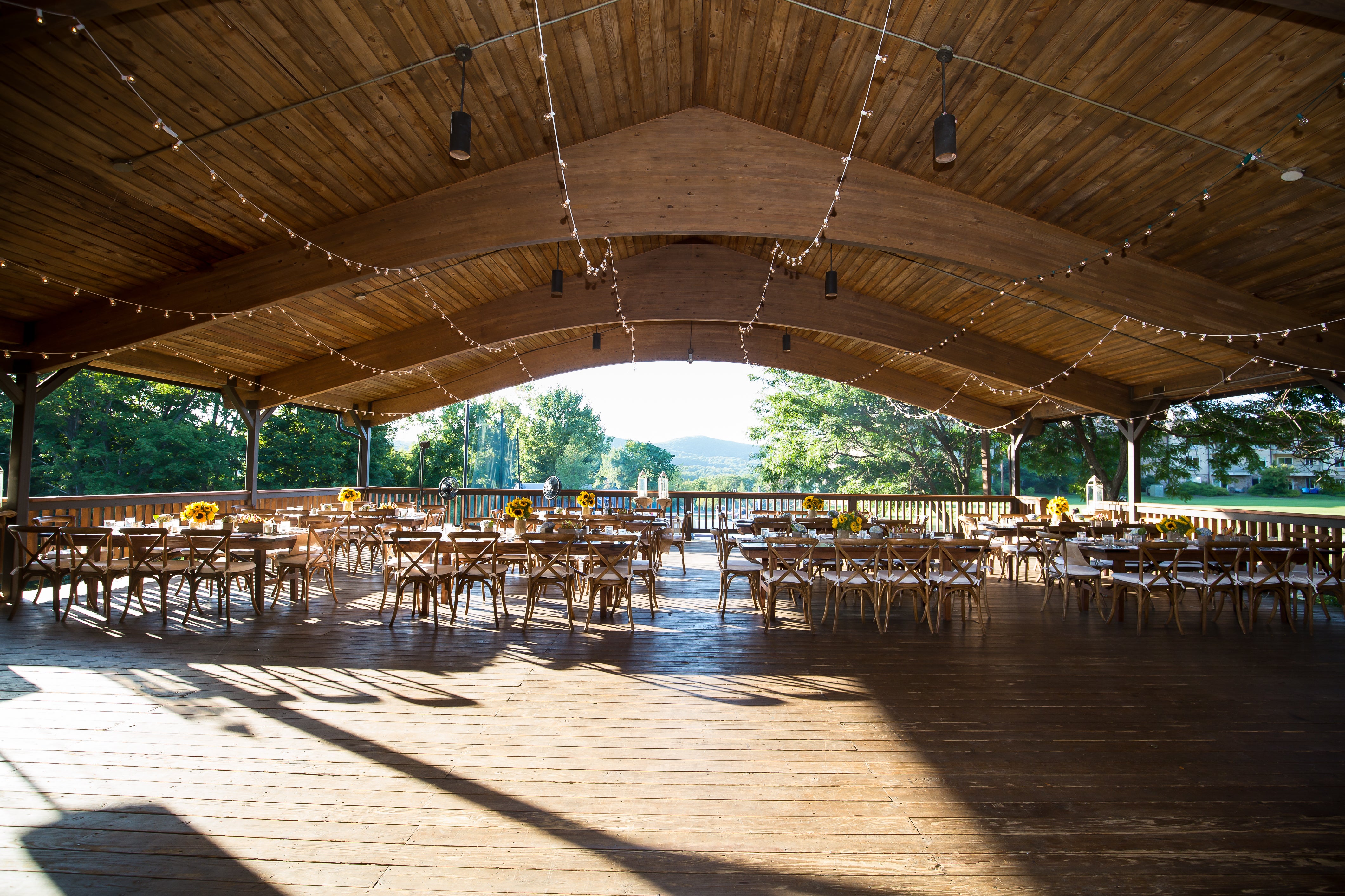 Inside view of Sweetgrass Pavillion with tables and chairs