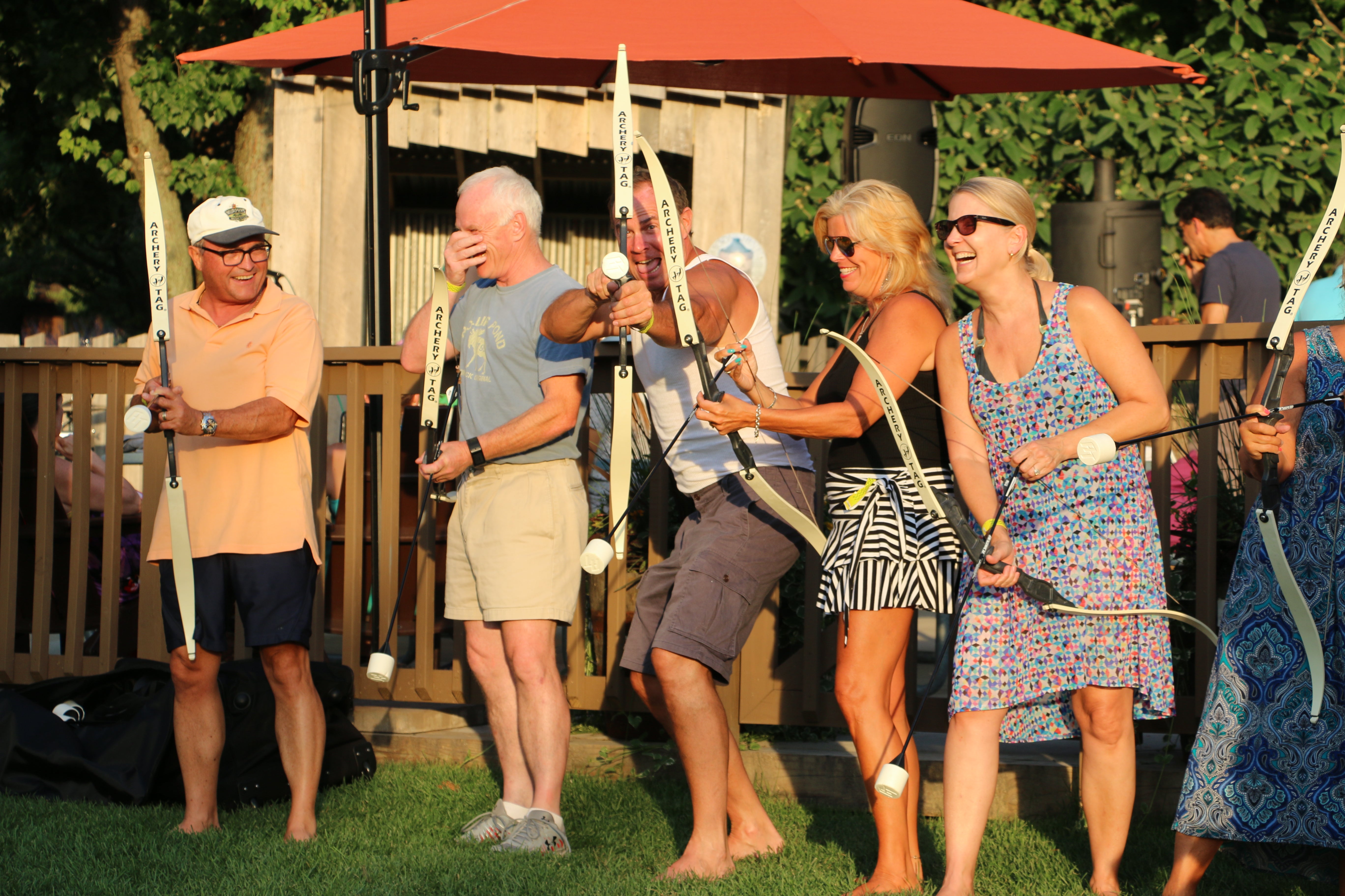 Adults enjoying a teambuilding activity with Archery Tag