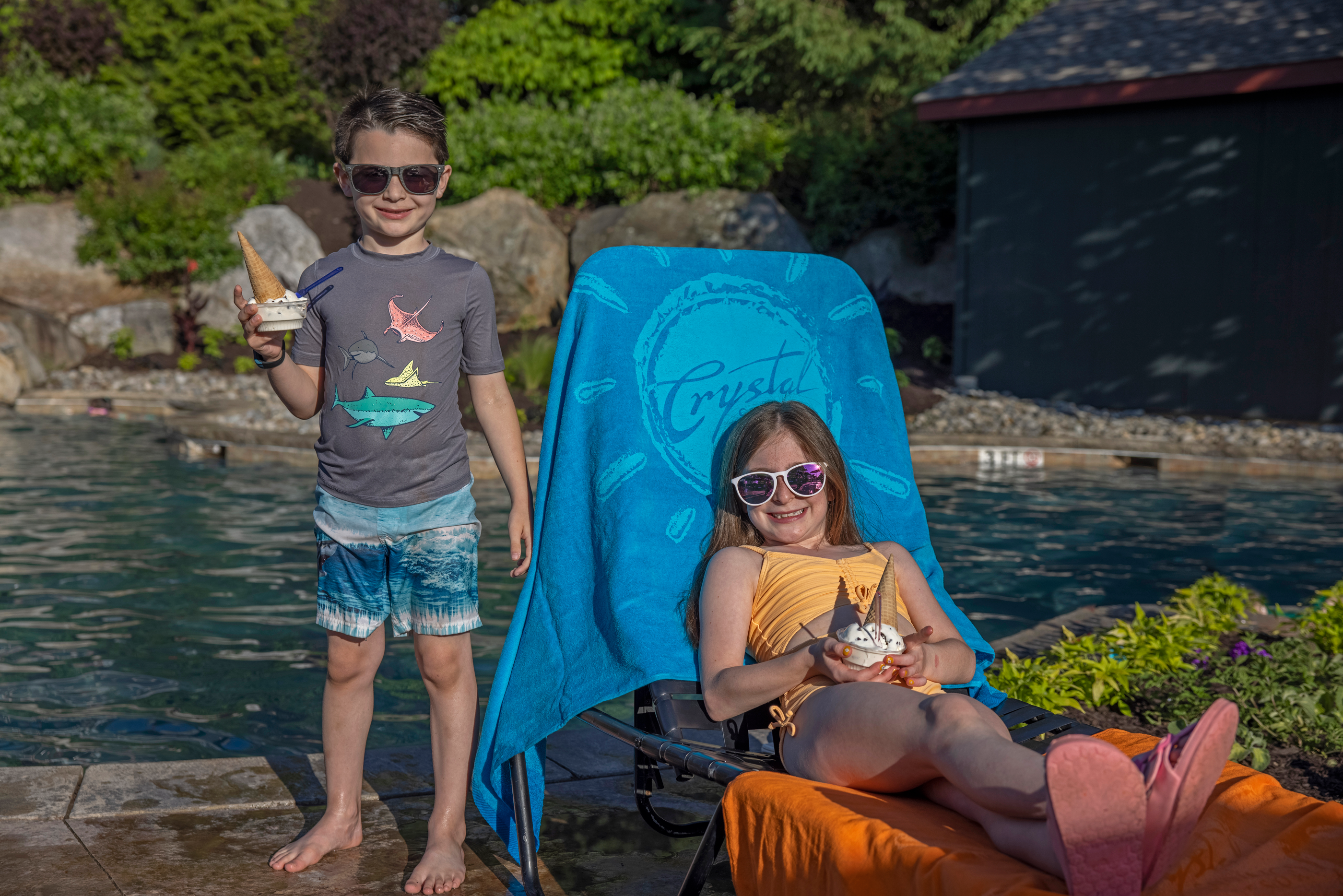 Children enjoying ice cream cones by the pool at Crystal Springs Resort in NJ
