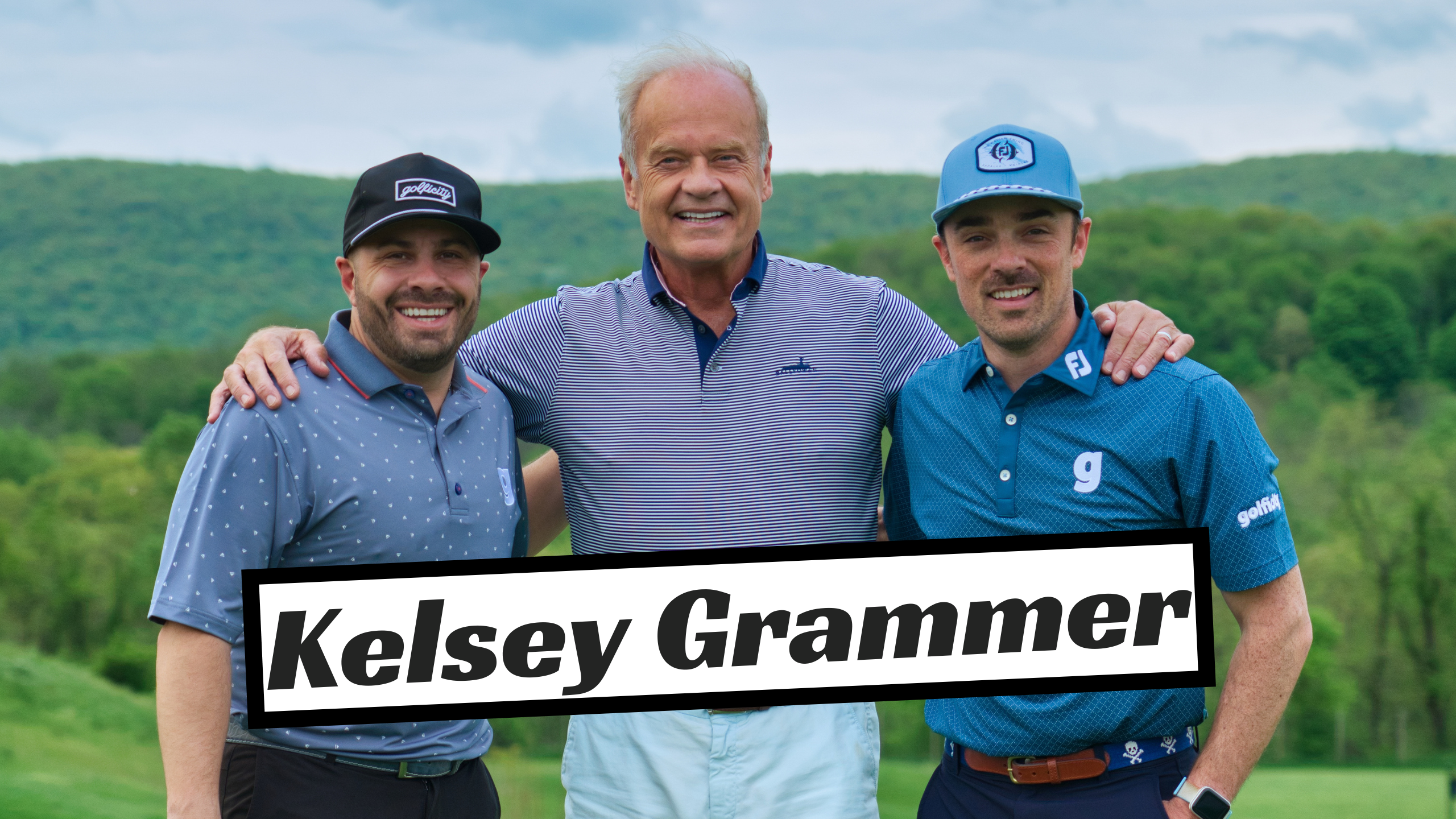 Kelsey Grammer standing with fans.