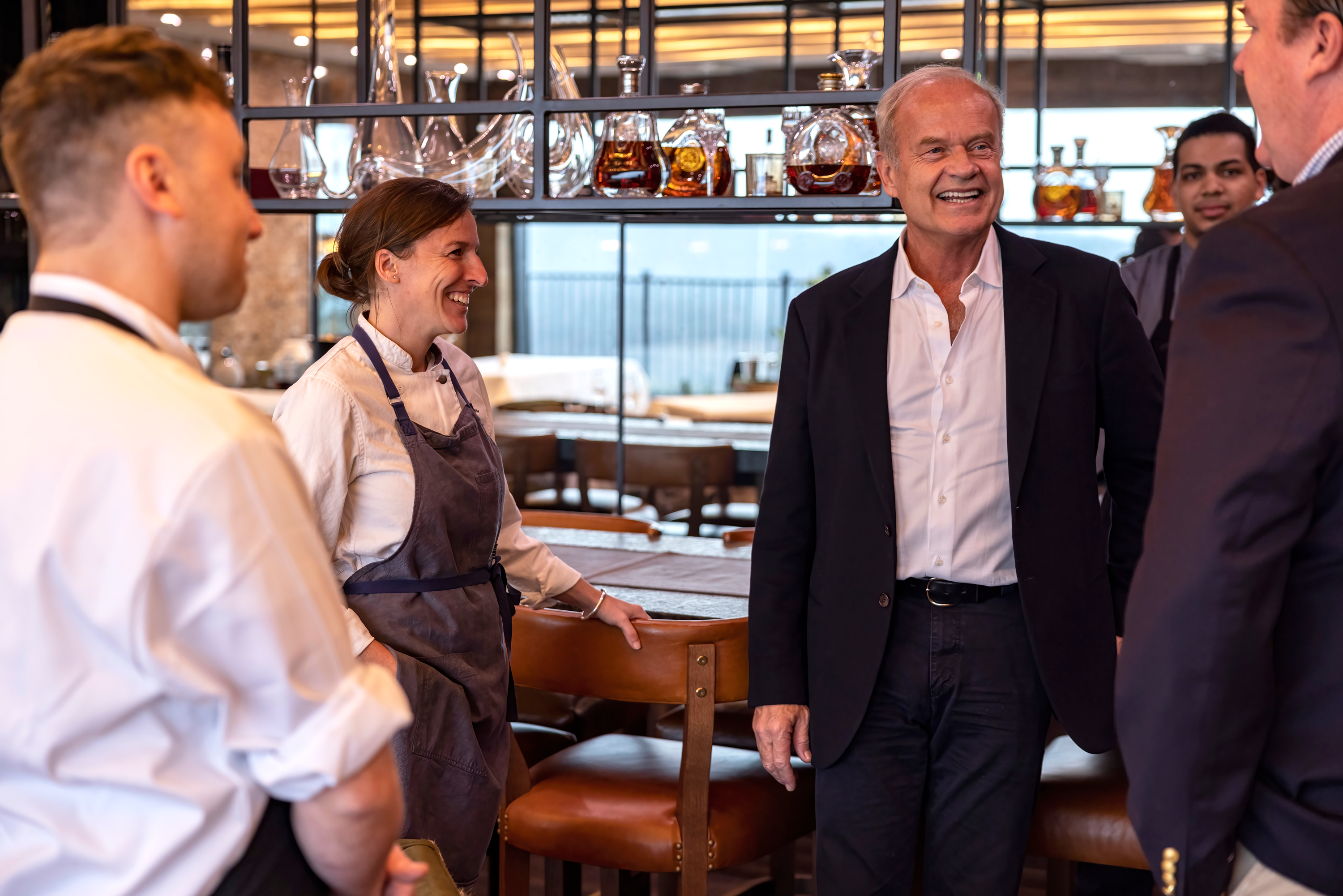 Kelsey Grammer speaking to people in latour