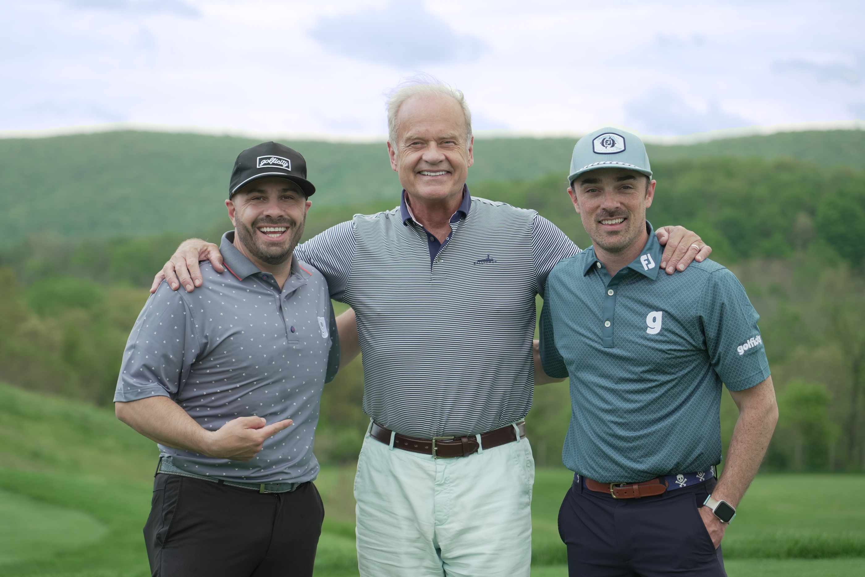 Kelsey Grammer standing with two men