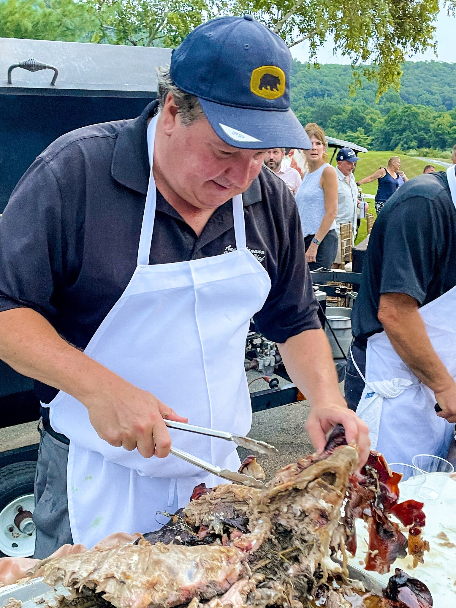 Chef carving at Black Bear Bourbon BBQ