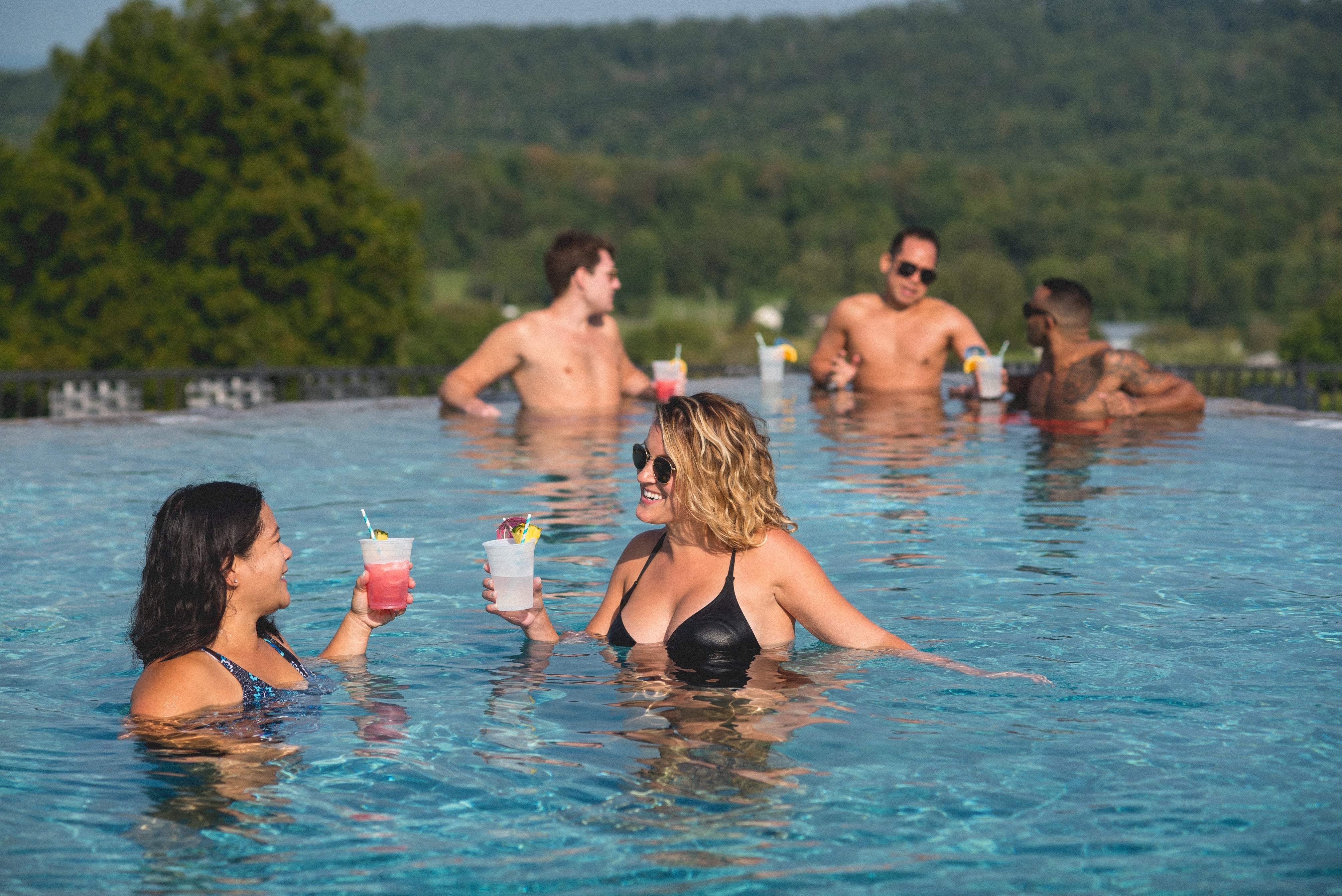 Group of friends in vista 180 pool.