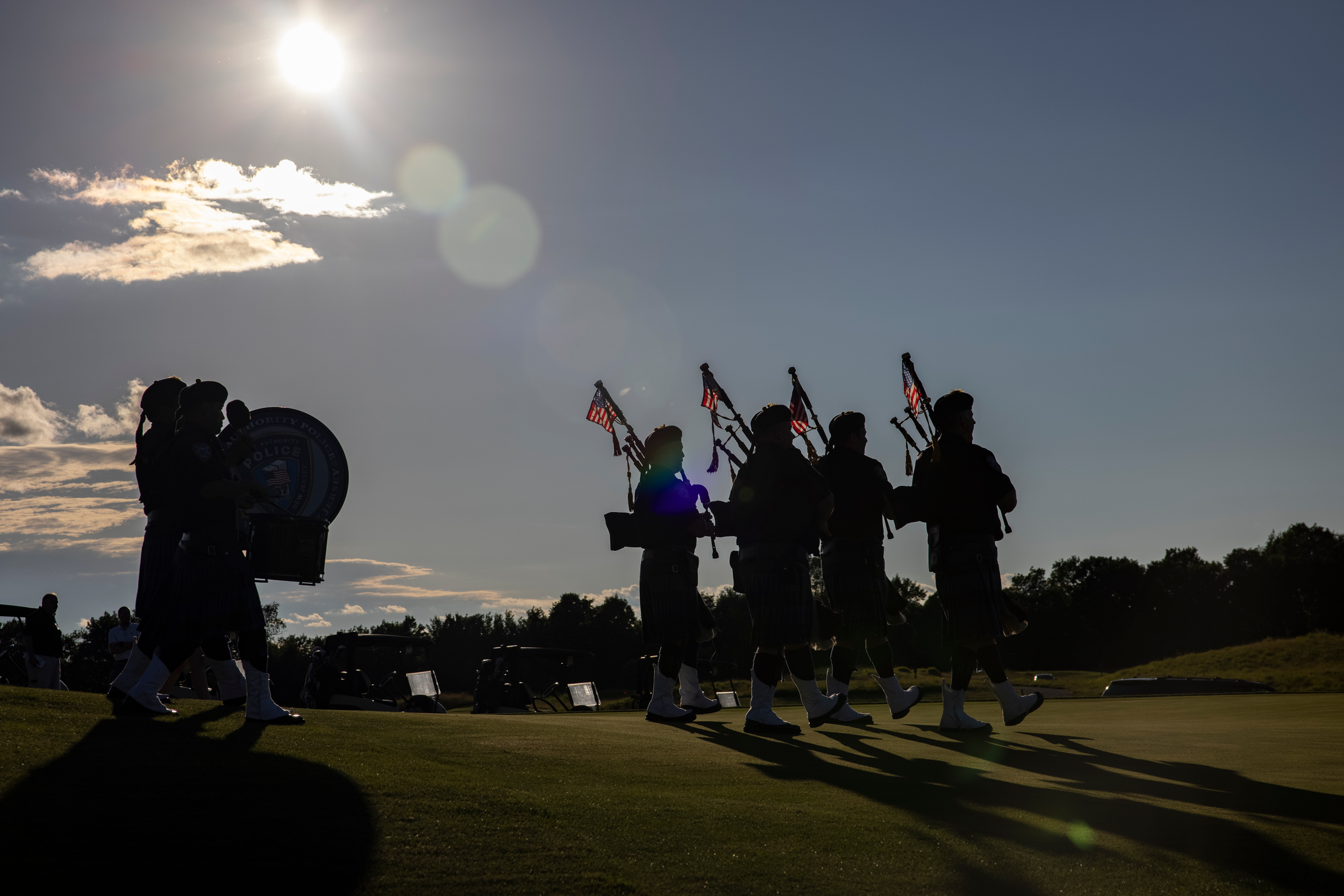 Marching band playing at Ballyowen Golf Club at sunset
