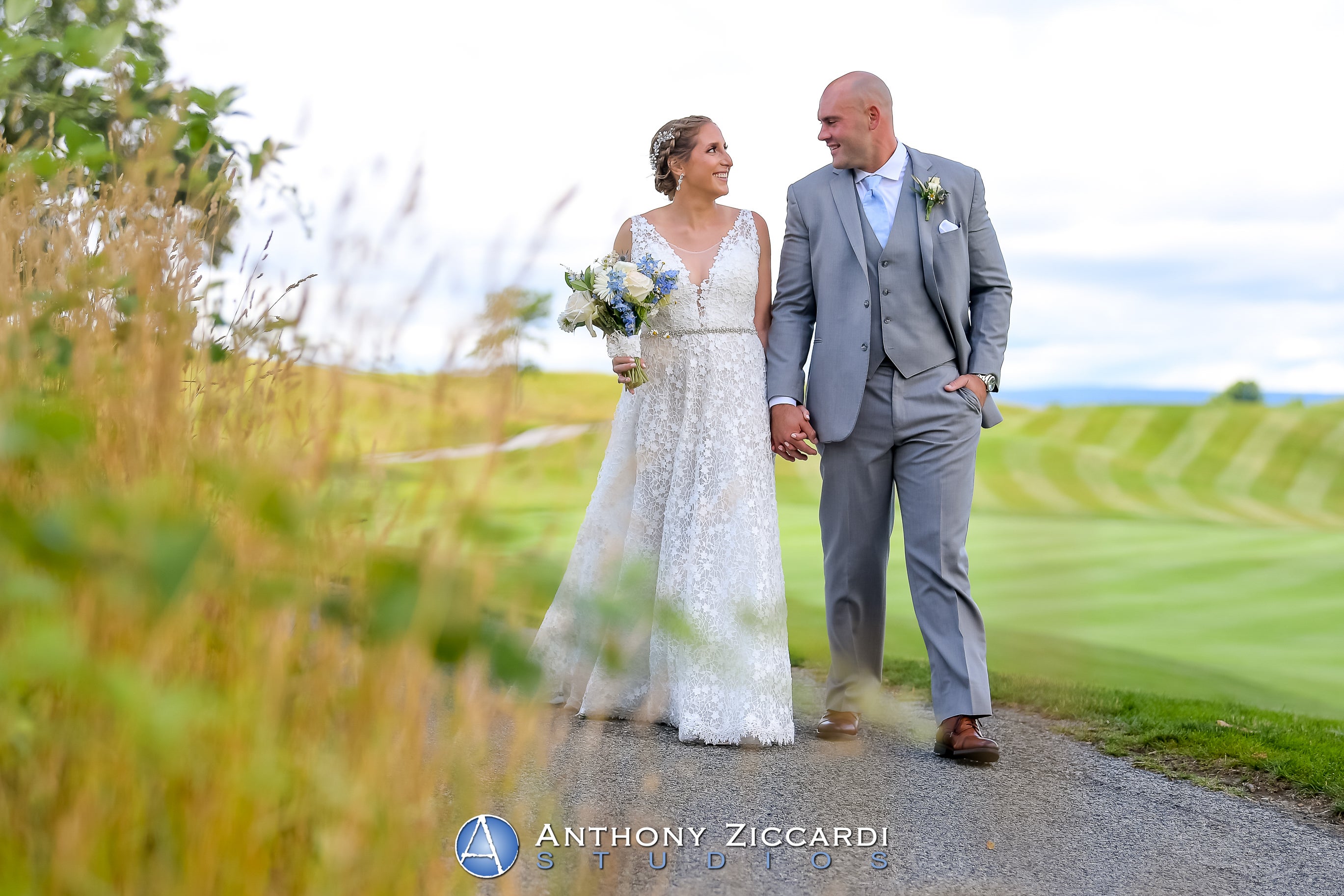 Bride and Groom walking the grounds at Ballyowen Golf Course