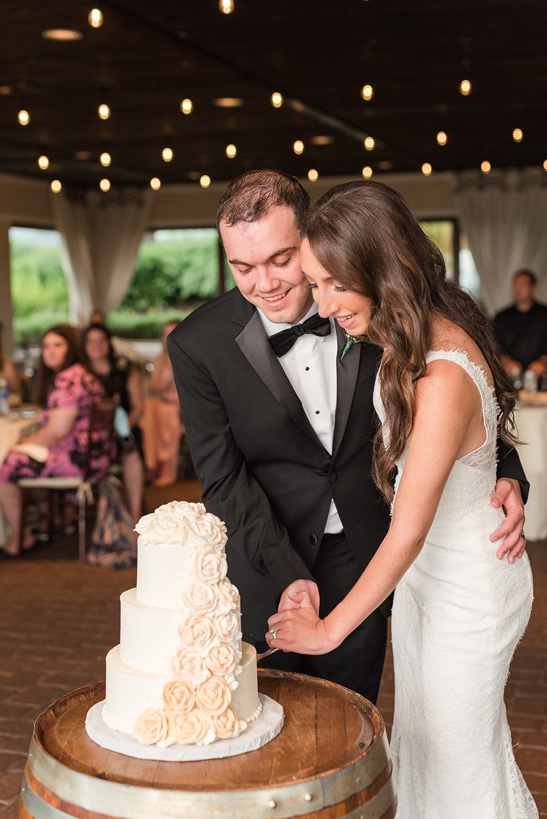 Bride and Groom cutting wedding cake