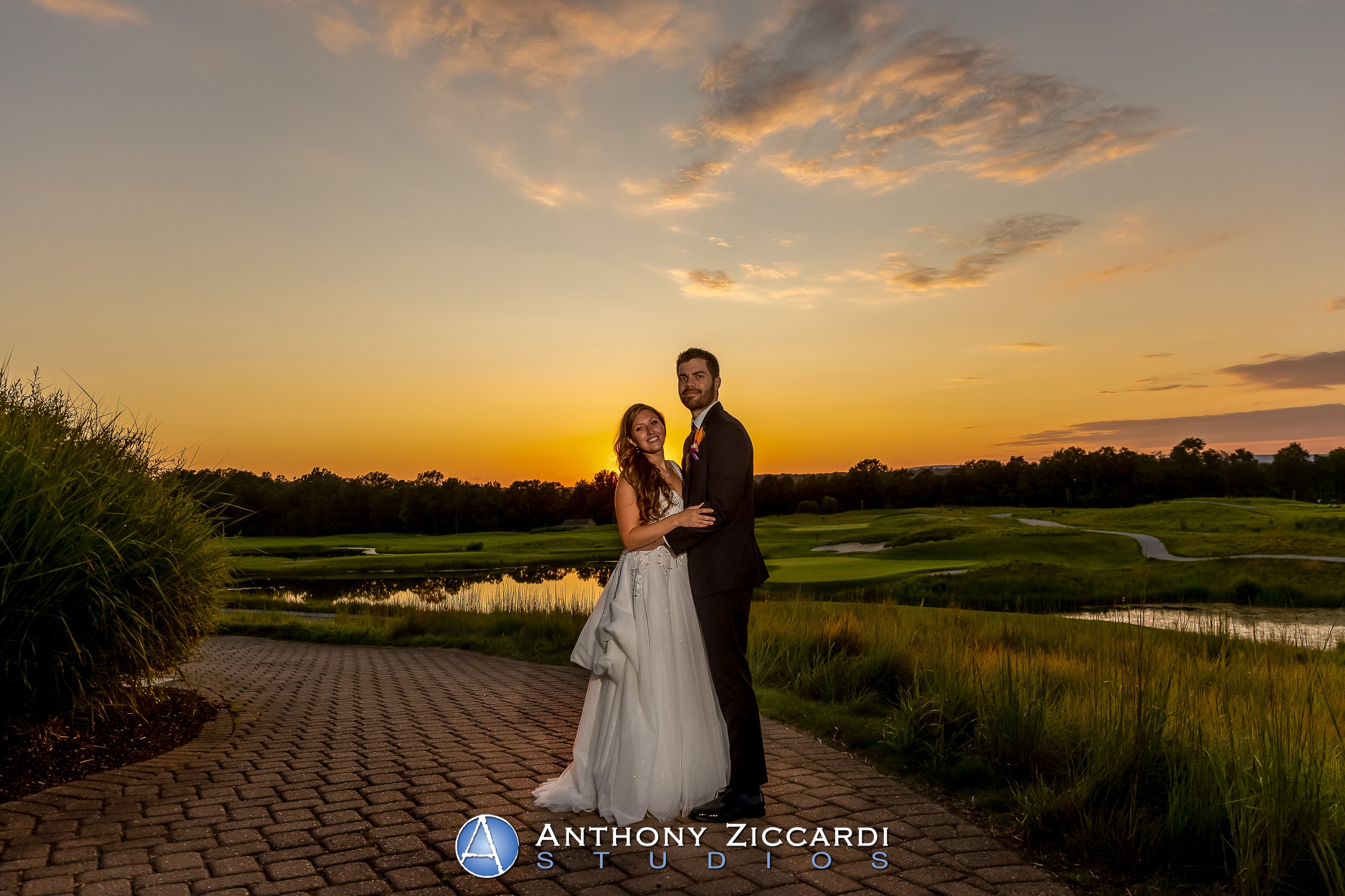 Bride and groom at sunset at Ballyowen Golf Club