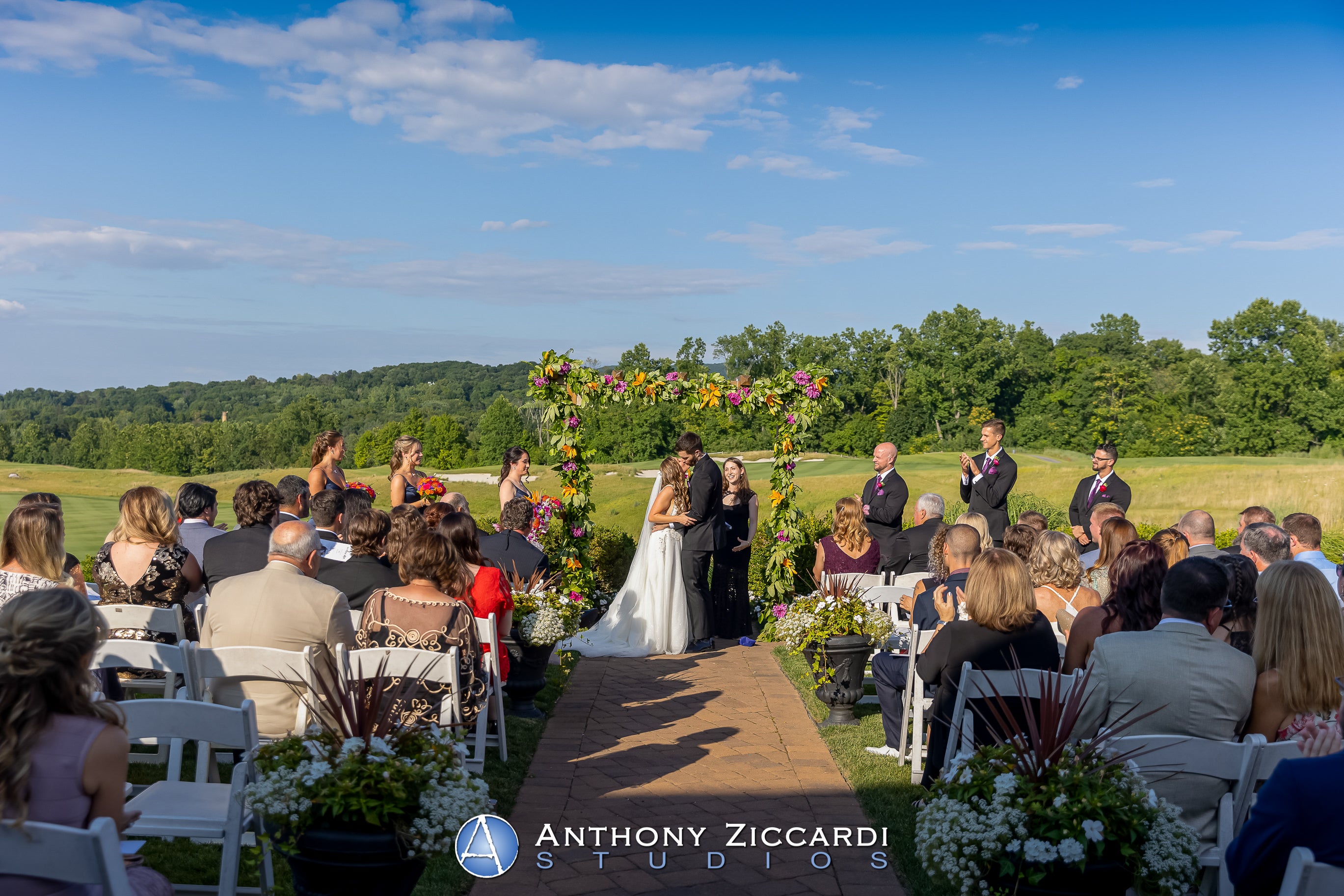 Couple kissing at wedding ceremony