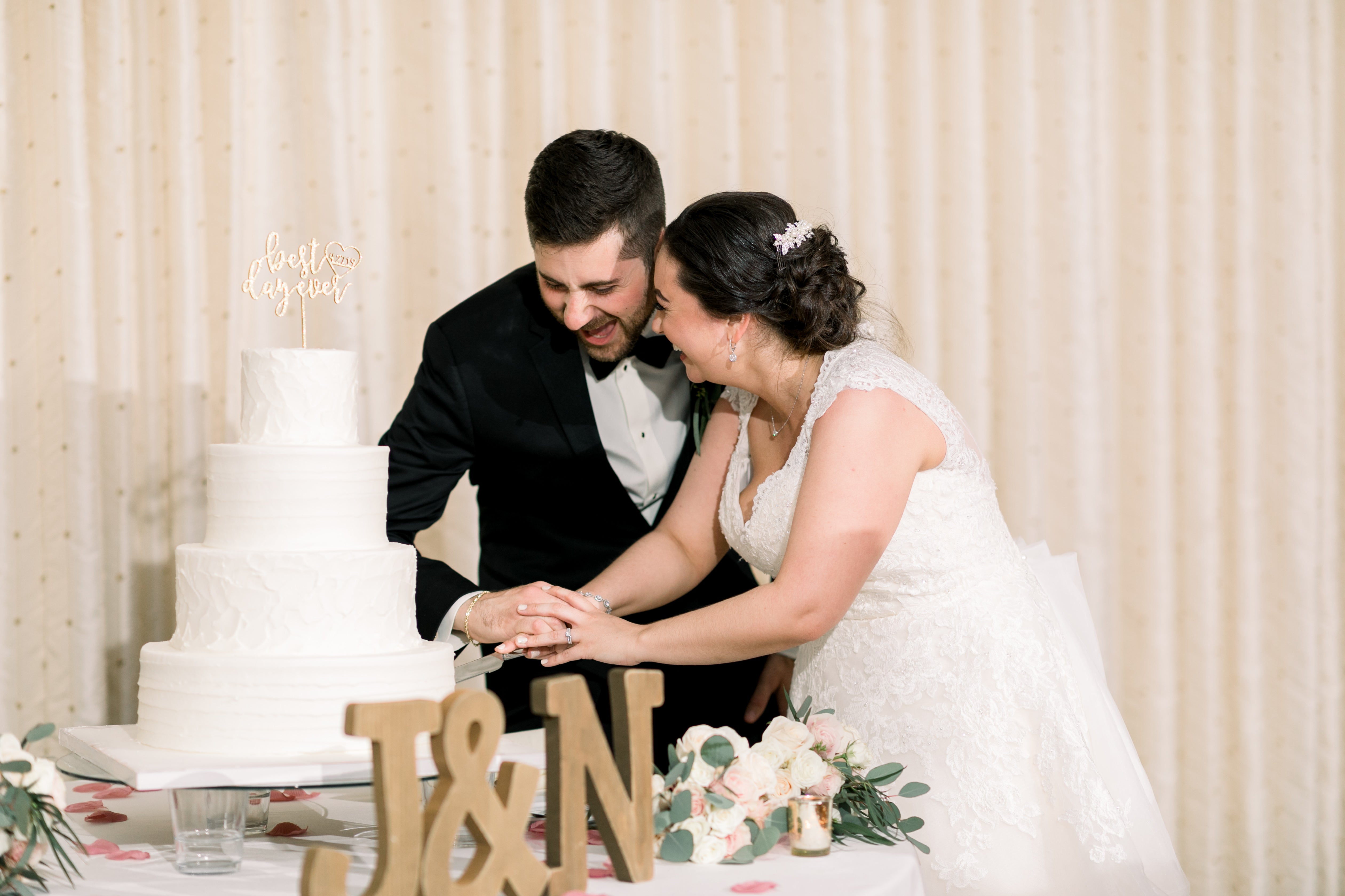 Bride and Groom cutting wedding cake
