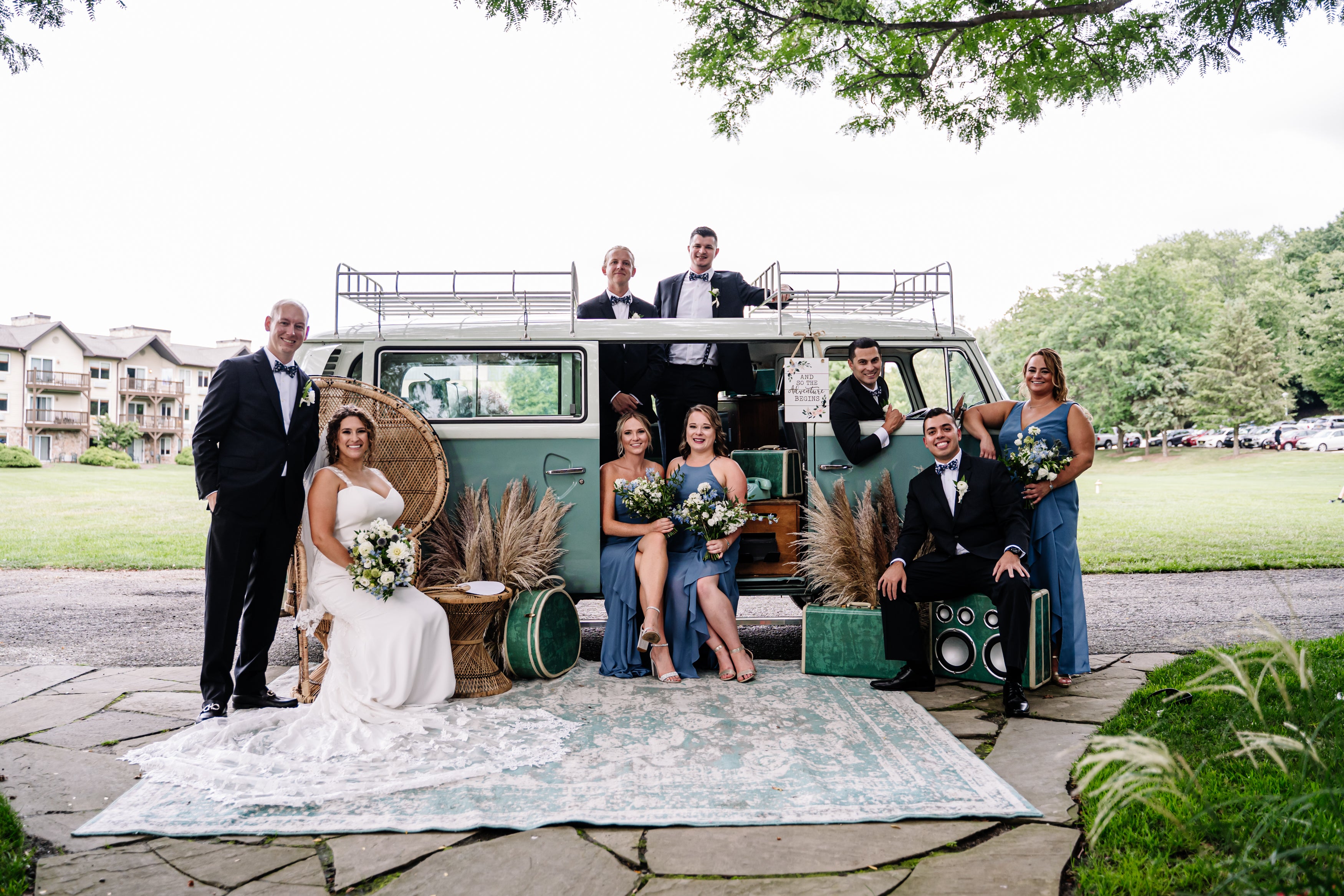 Wedding party sitting in green VW van