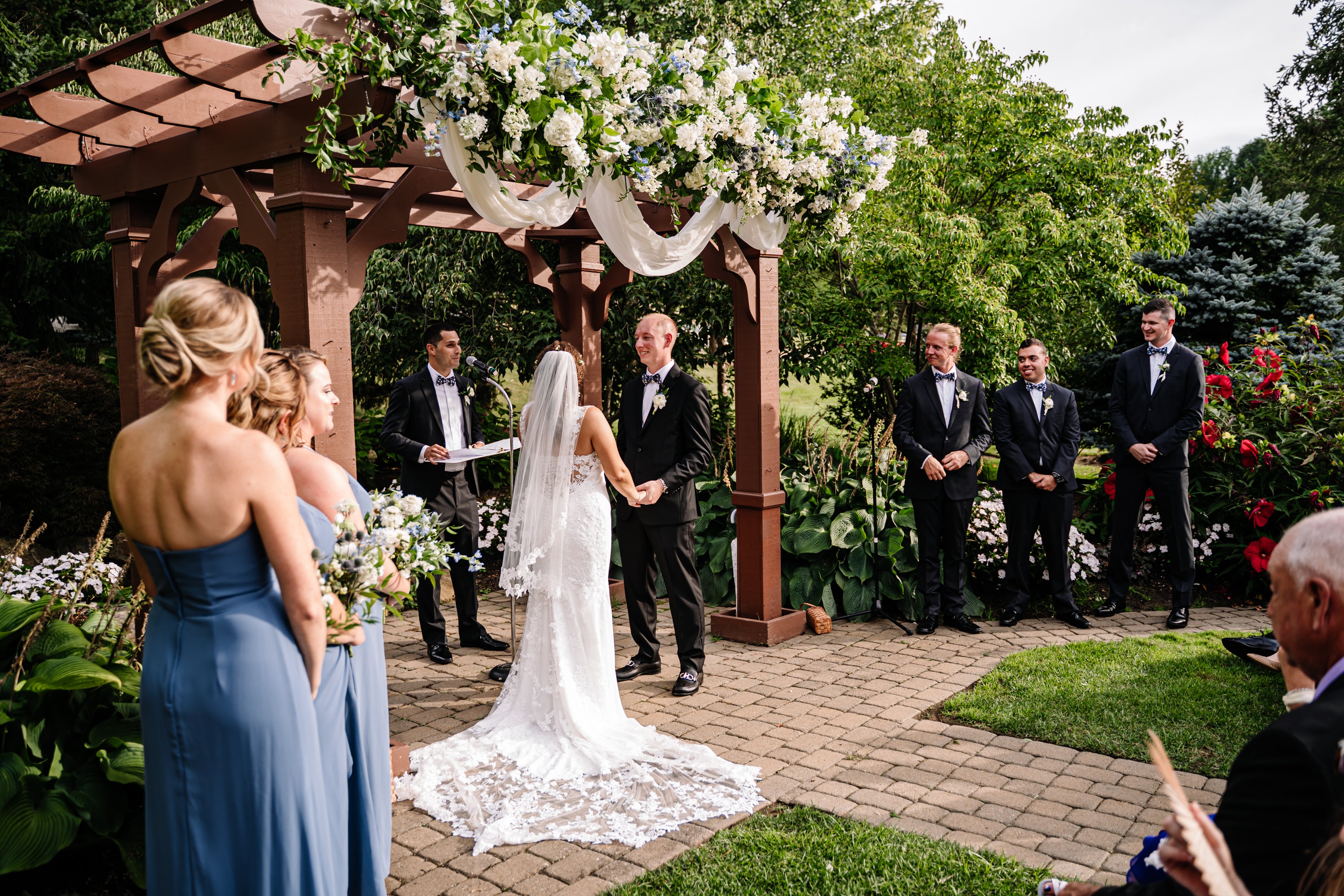 Bride and Groom at alter in Minerals Wedding garden