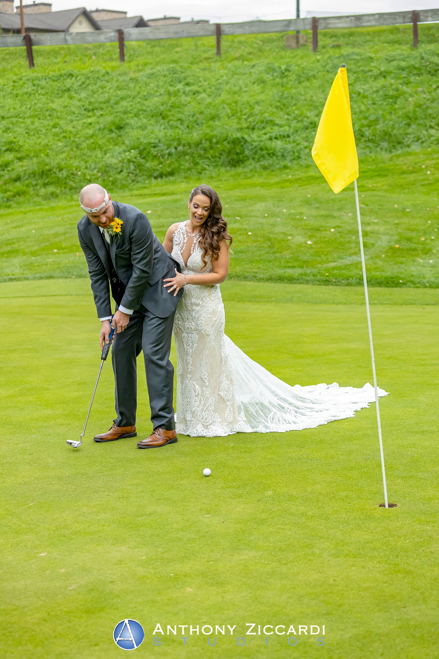 Bride and Groom playing on a golf course