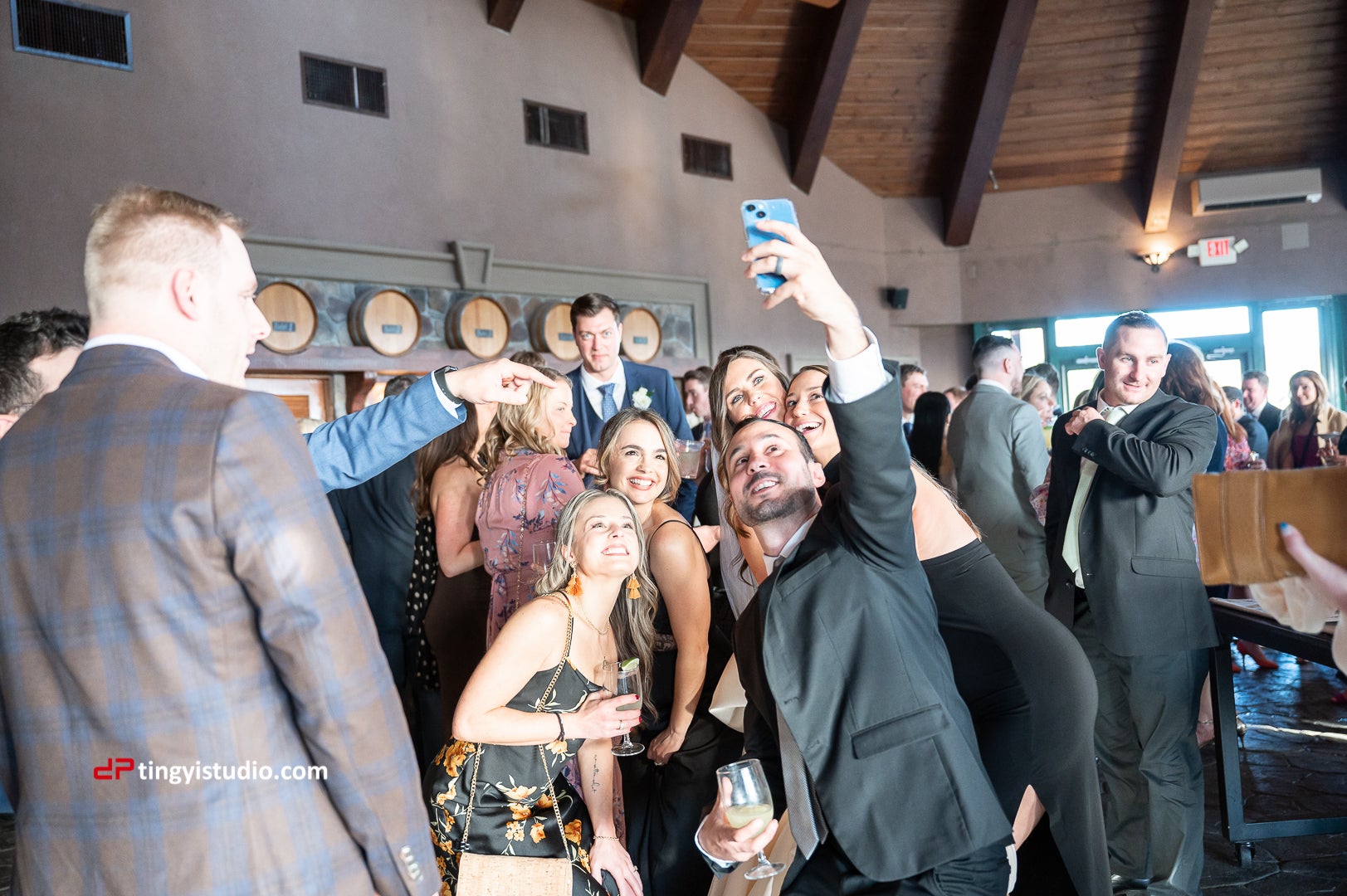 Wedding guests taking selfies