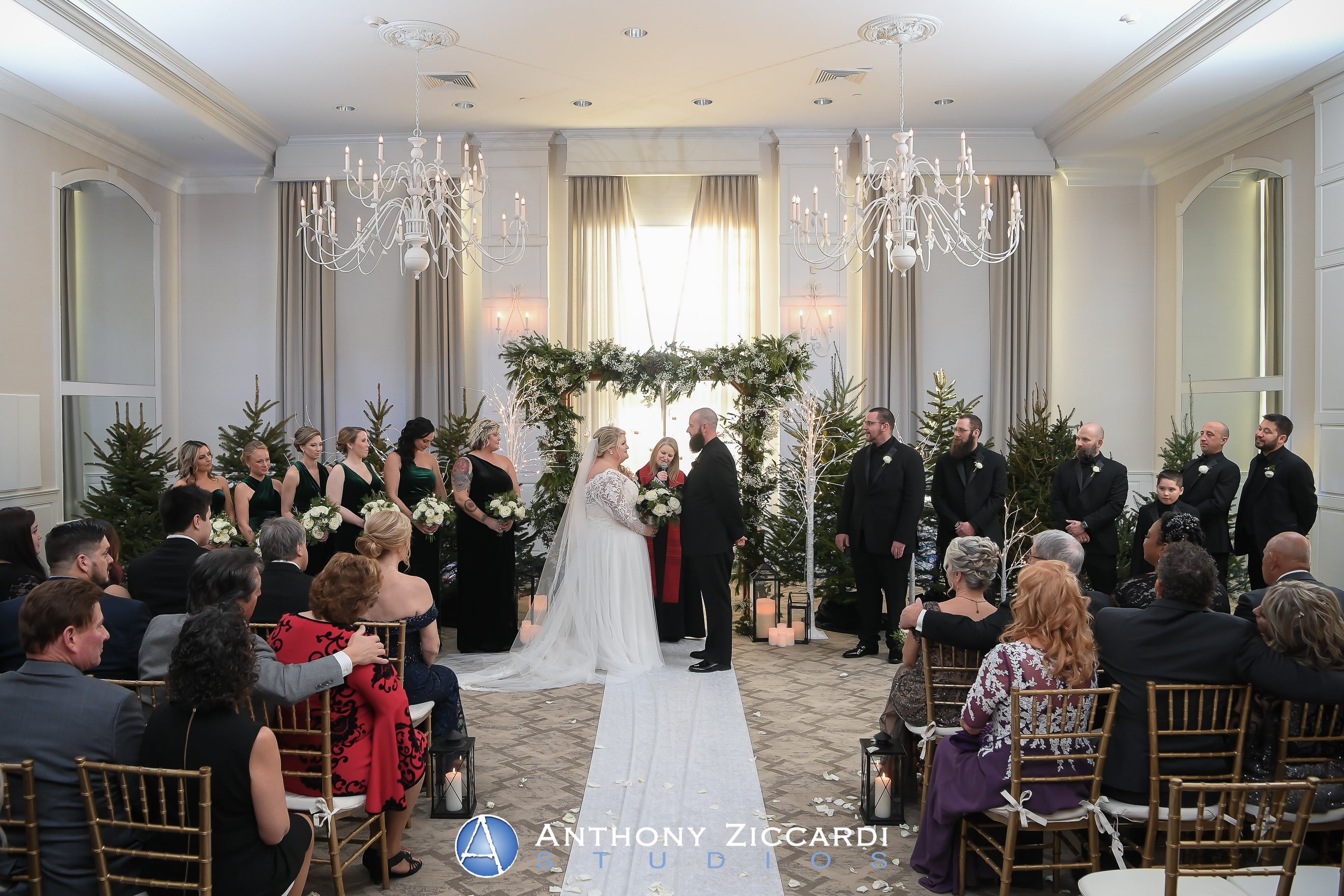Winter wedding ceremony in the Emerald Ballroom at Crystal Springs Country Club