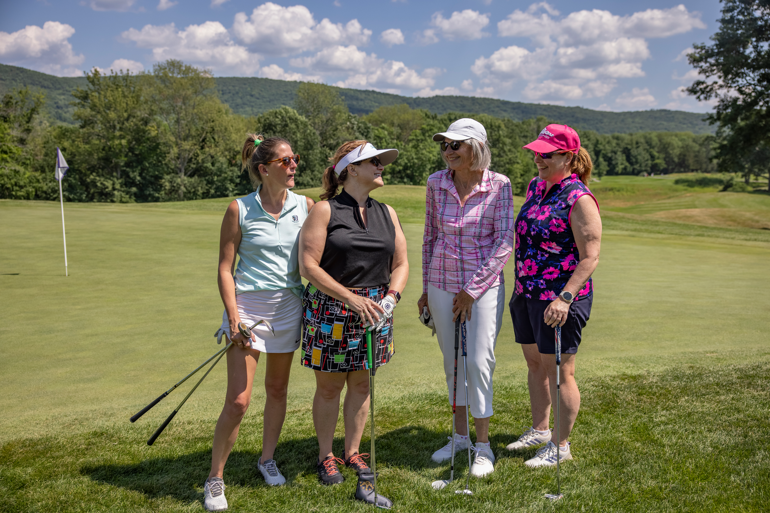 Women foursome on a golf course at Crystal Springs Resort