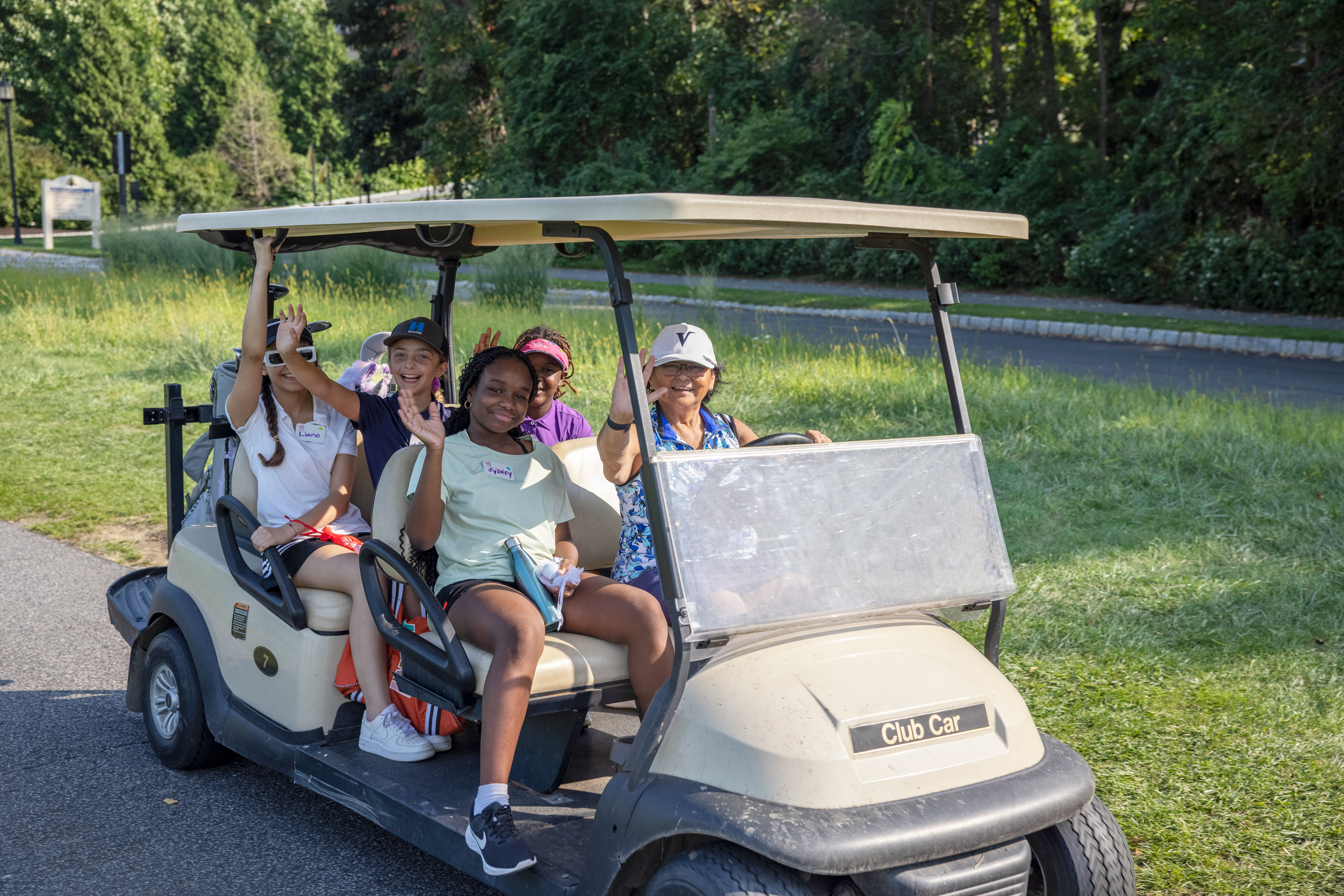 Girls on a golf cart at Crystal Springs Resort
