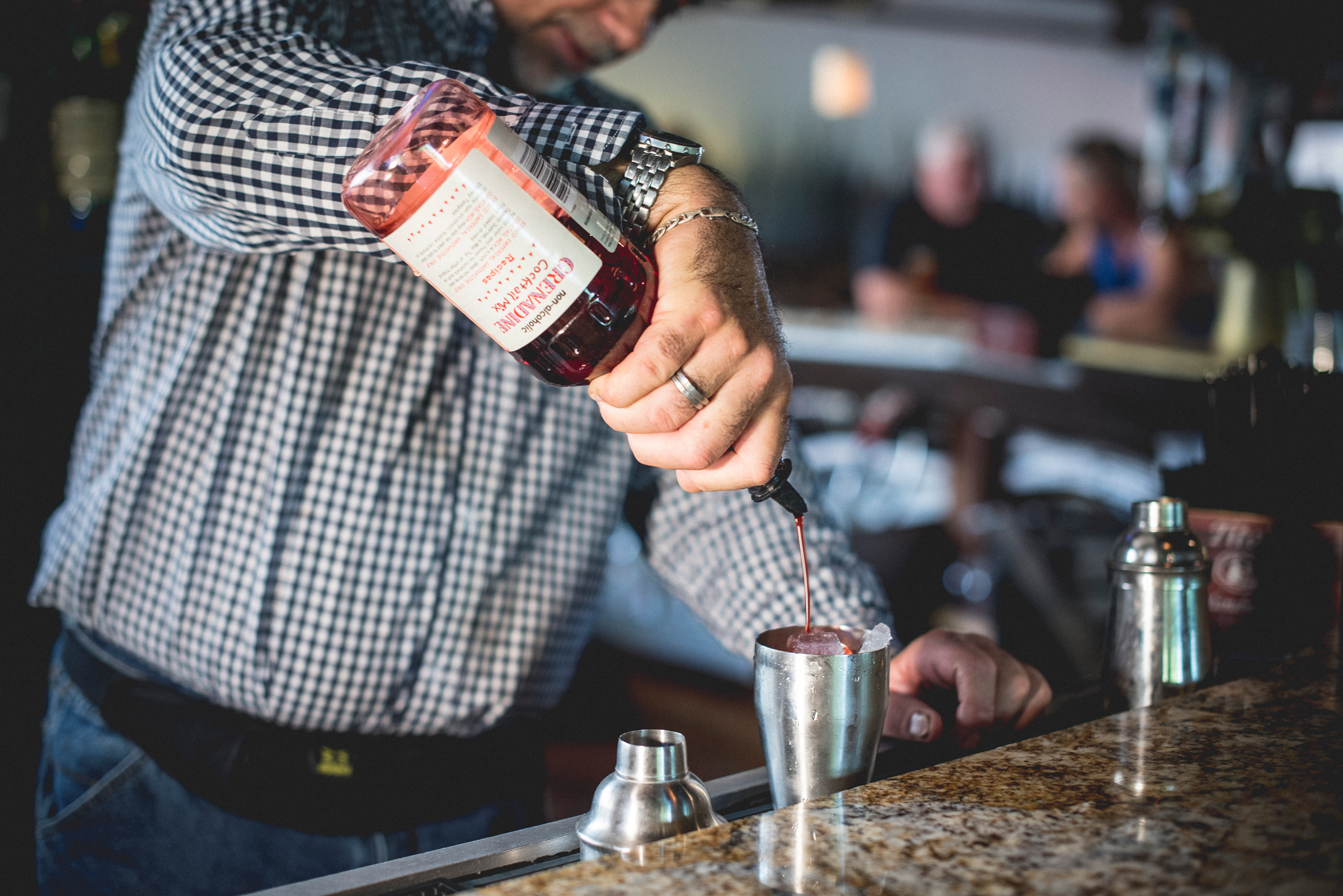 Bartender making a cocktail at Kites Restaurant