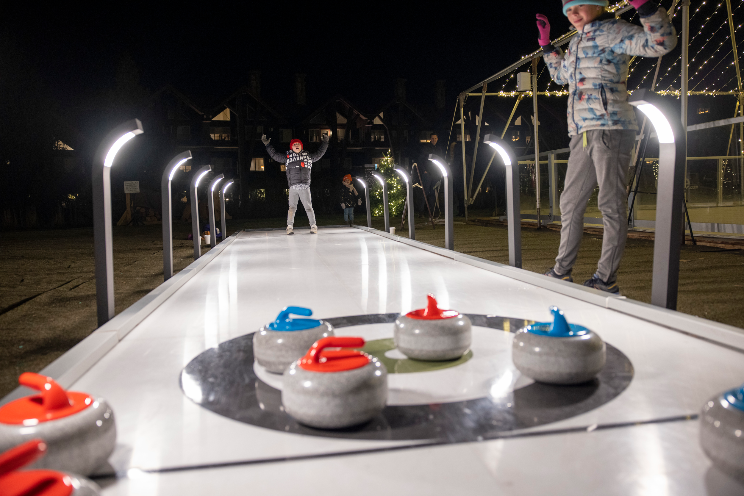 Curling stones on ice.