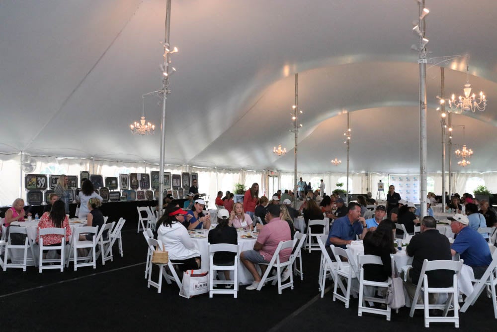 Large event in a tent taking place at Crystal Springs Resort