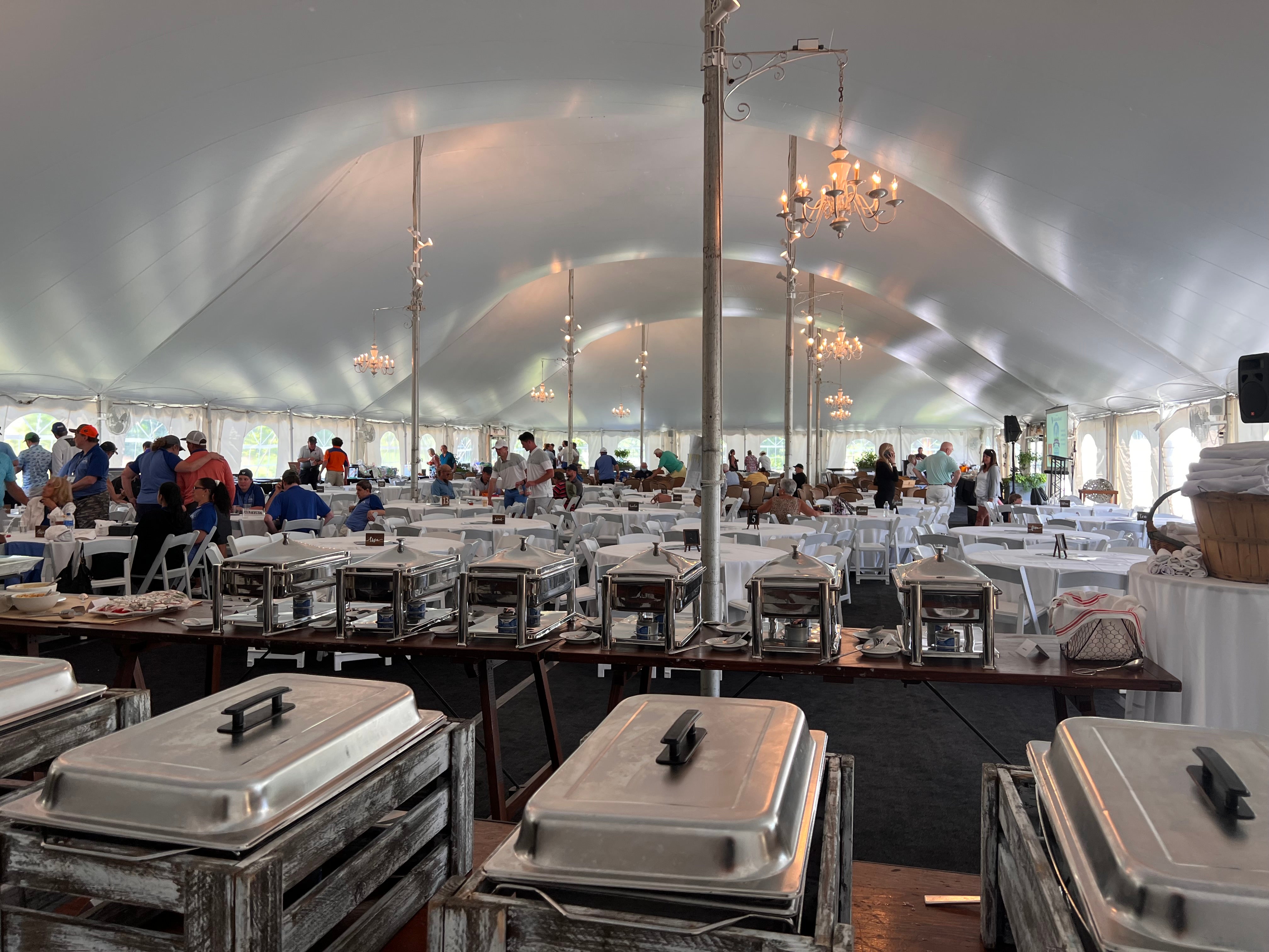 A food buffet display in an event tent