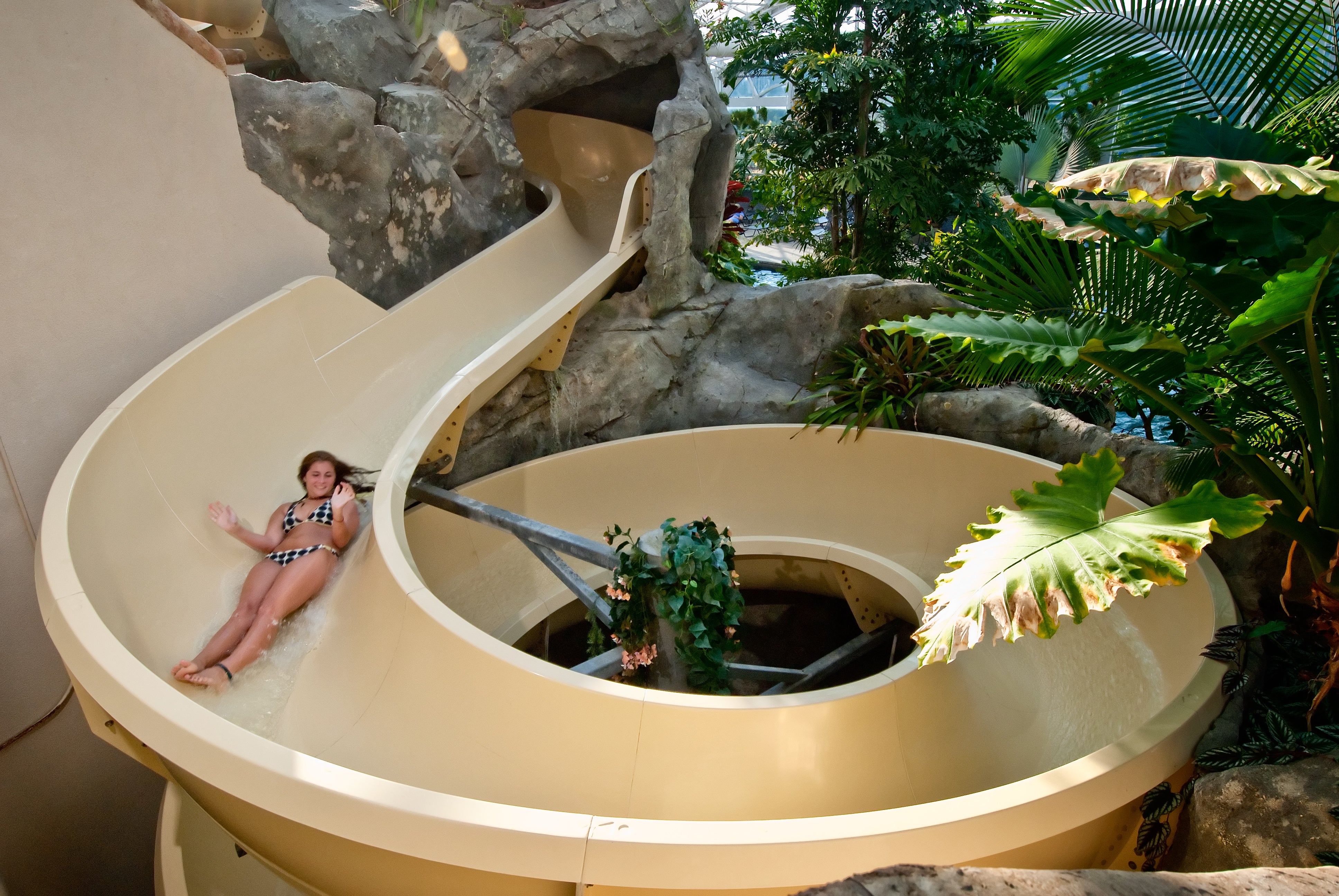 Girl going down Biosphere water slide at Crystal Springs Resort in NJ