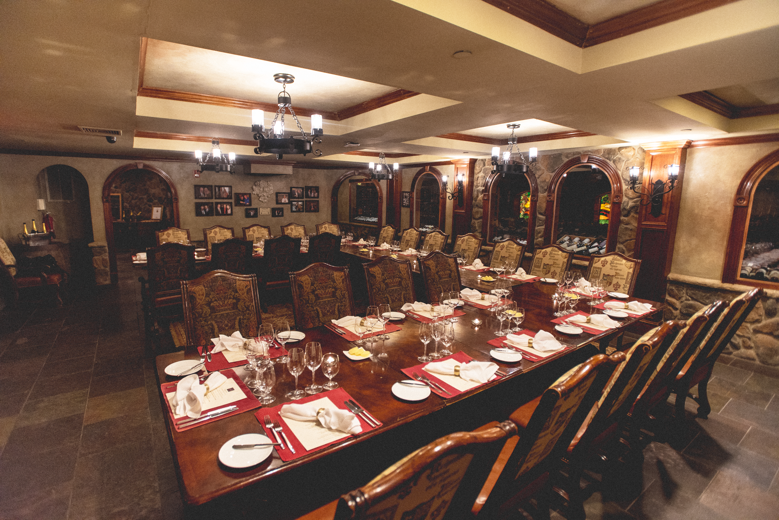 U shaped table set up in the Wine Cellar.