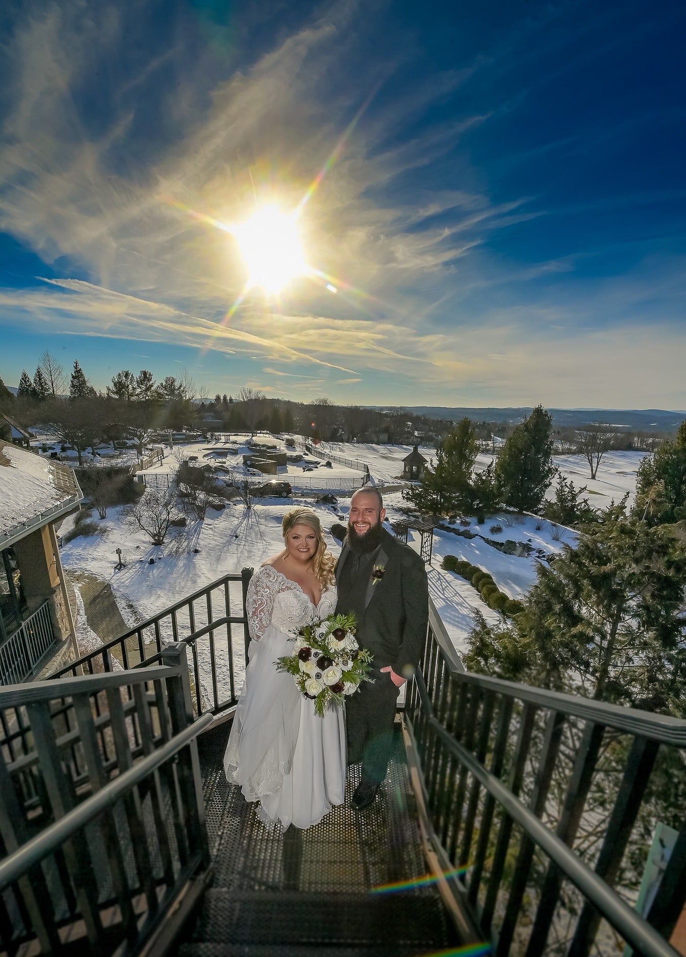 Bride and Groom from a winter wedding with a view of the valley from the Crystal Springs Clubhouse.