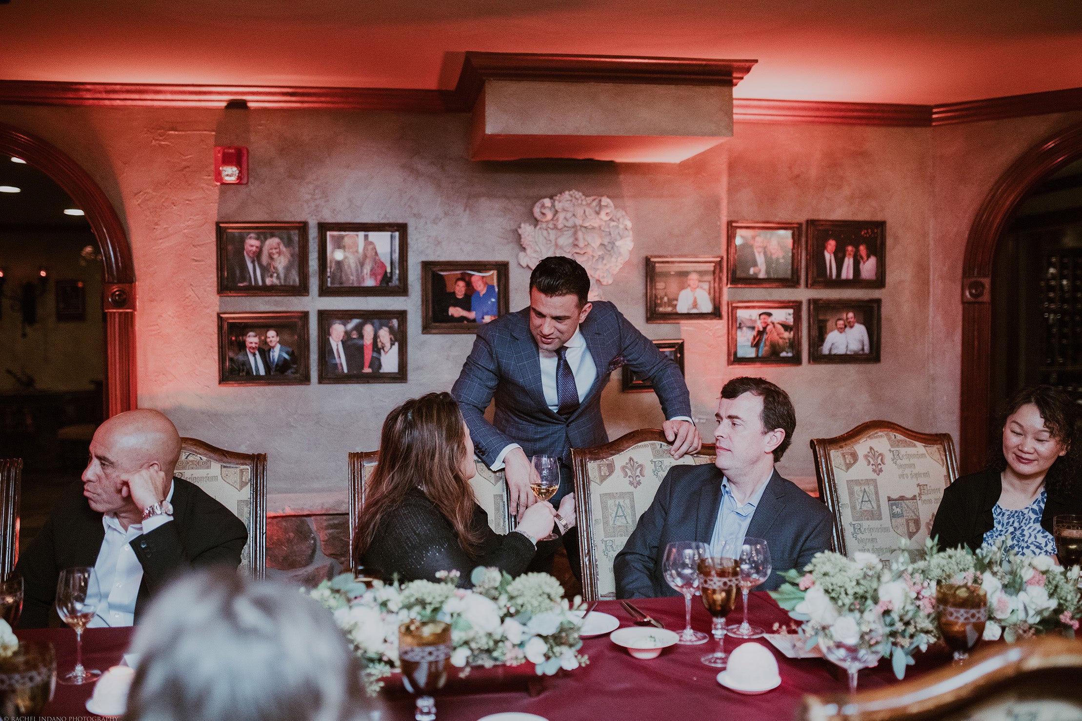 Robby Younes talking with guests in The Wine Cellar.