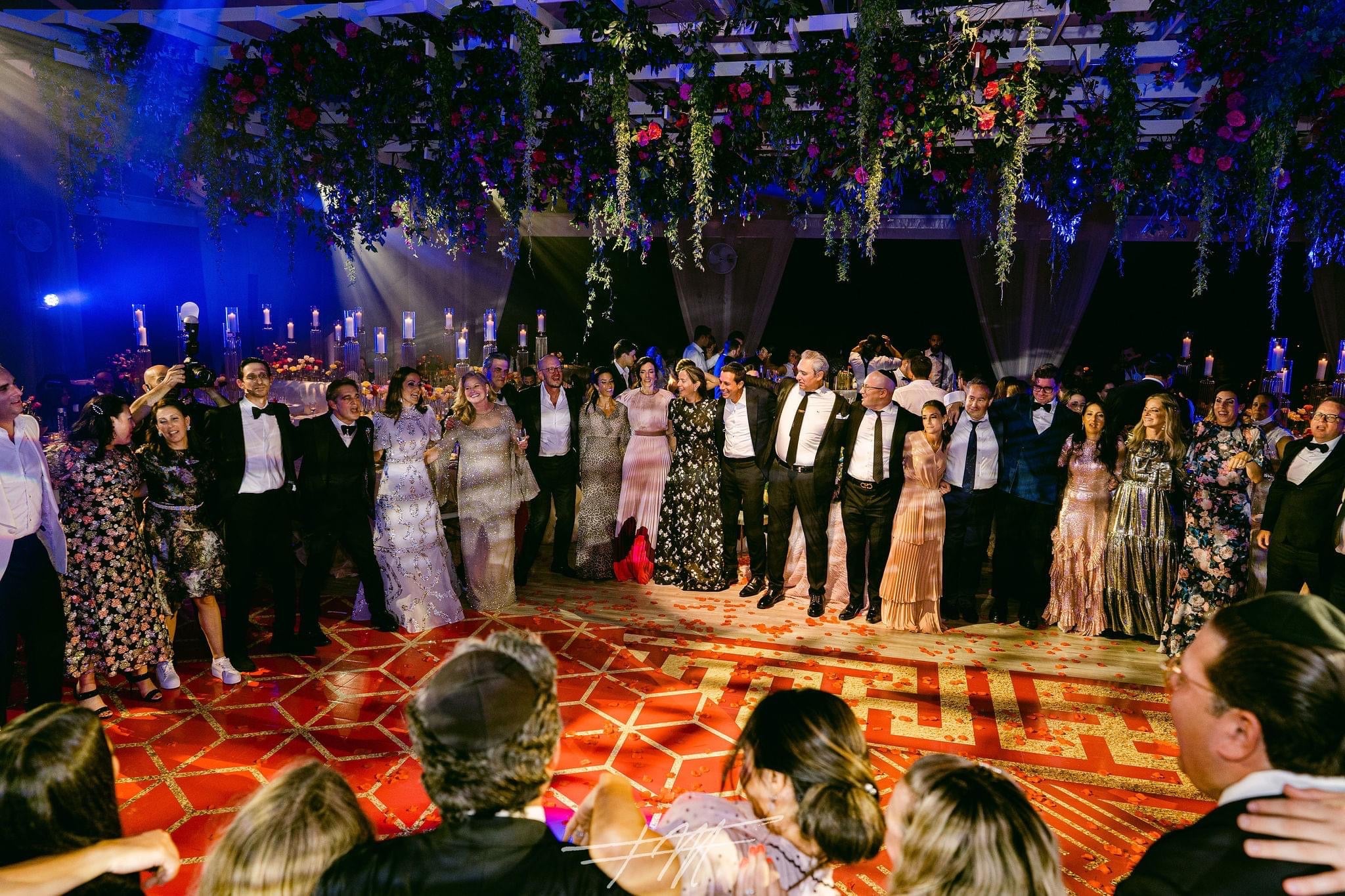 People standing around dance floor at Big Sky Pavillion.