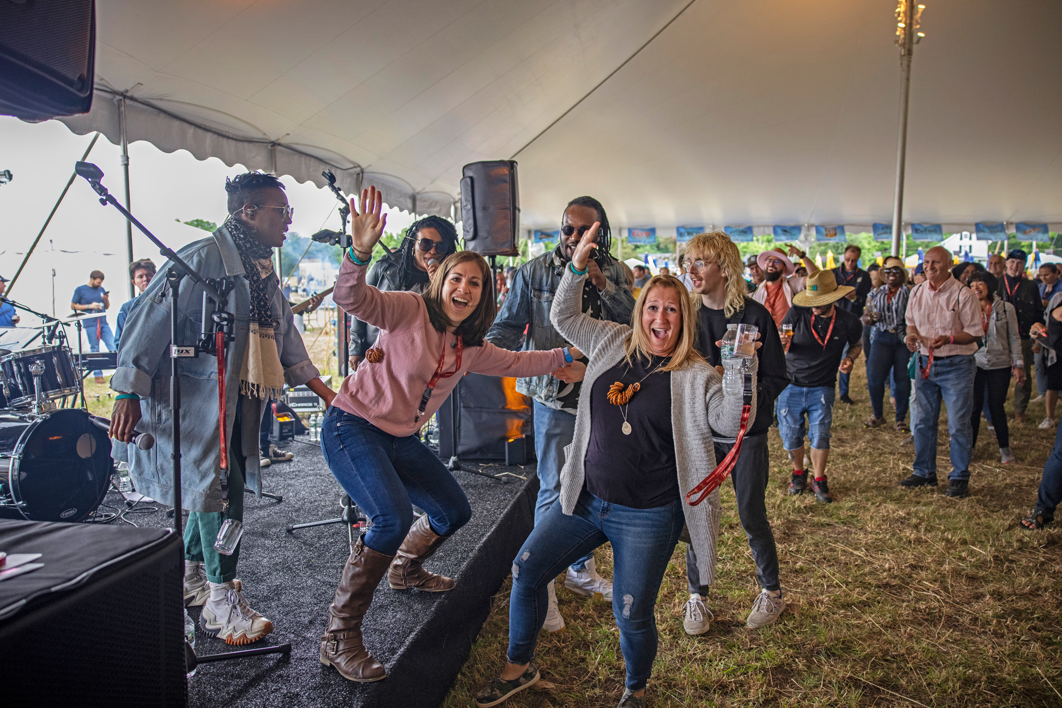 Beer fest attendees smiling.
