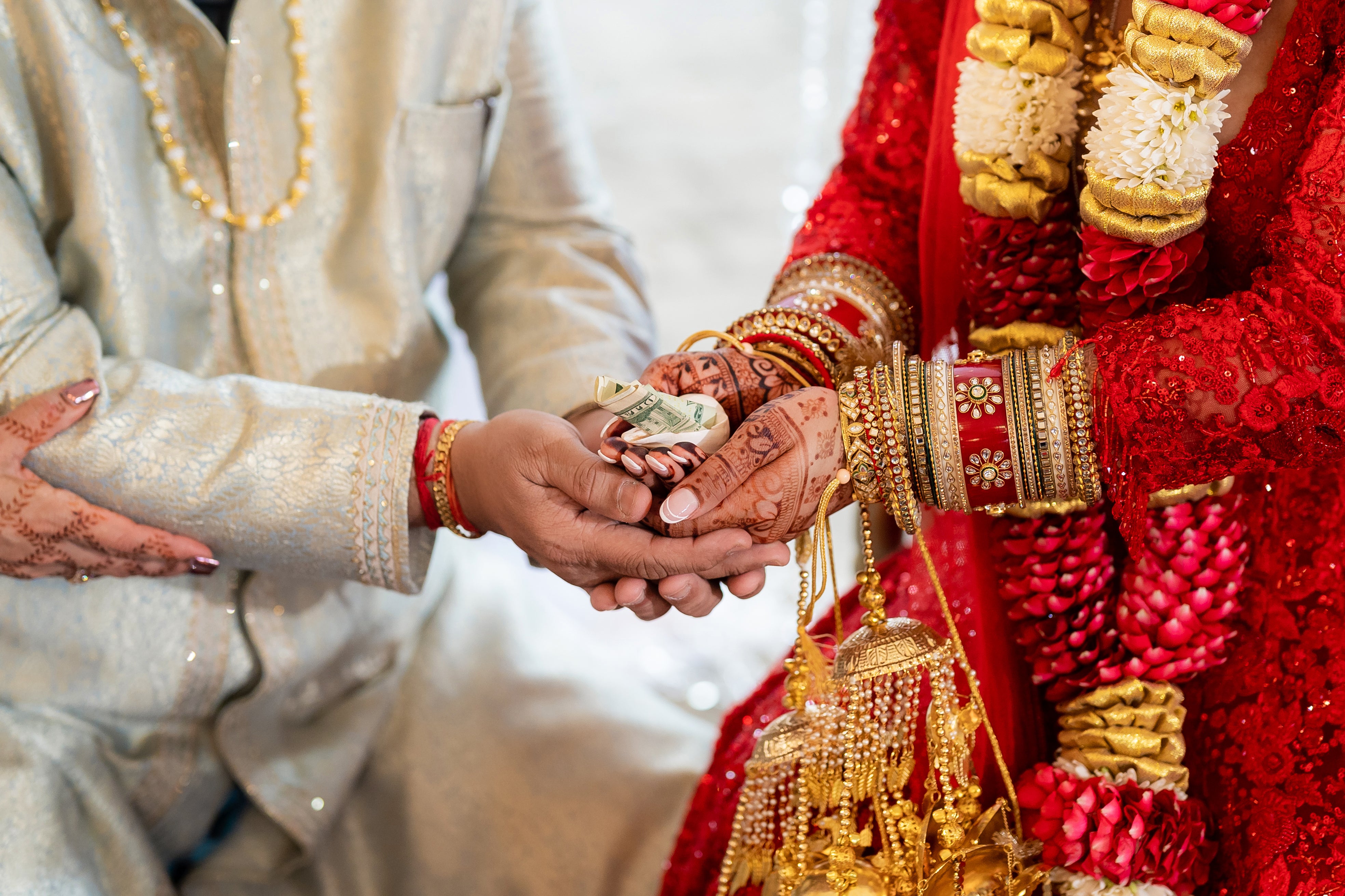 Bride and Groom holding hands