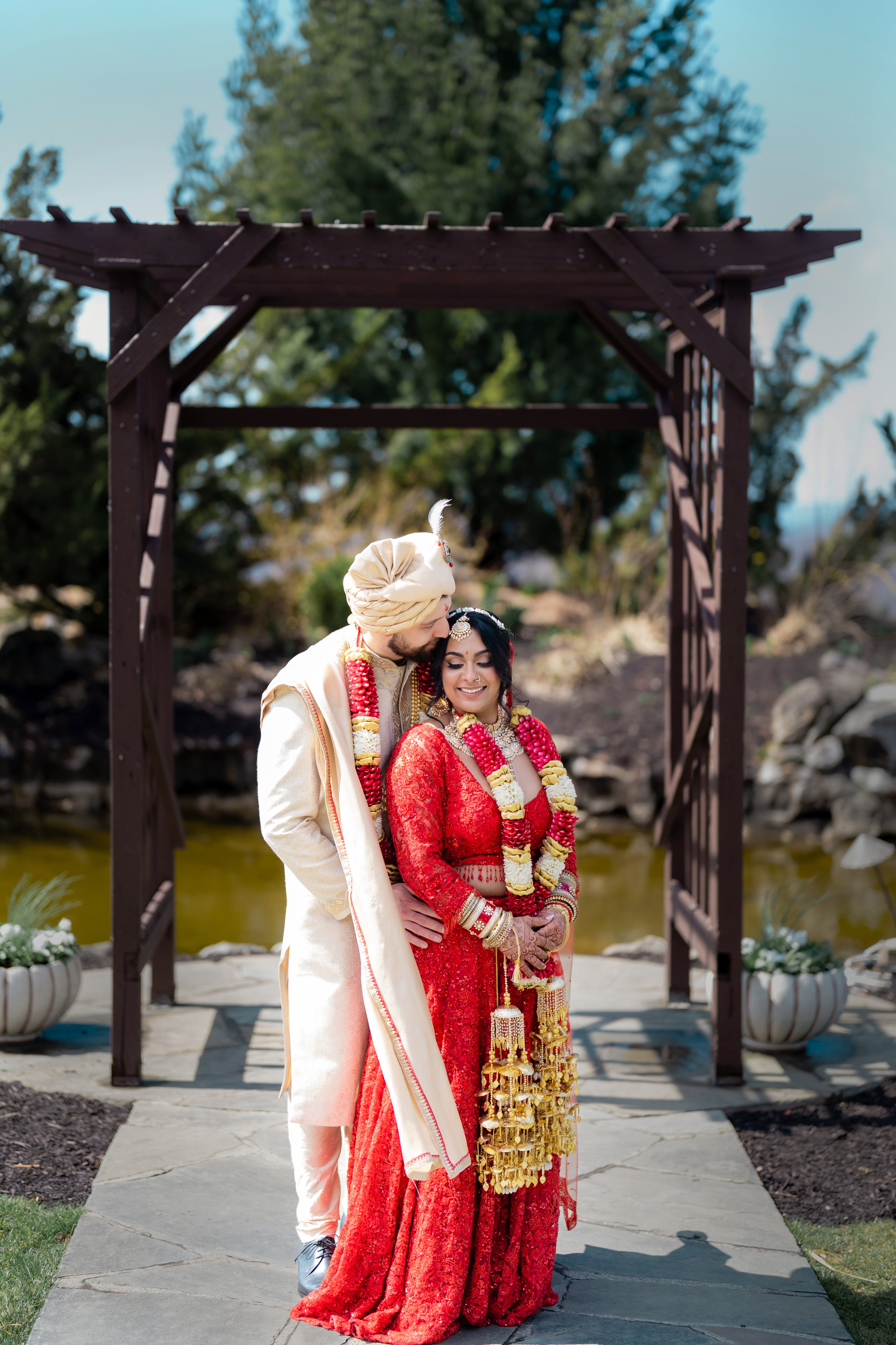 Indian bride and groom at wedding alter