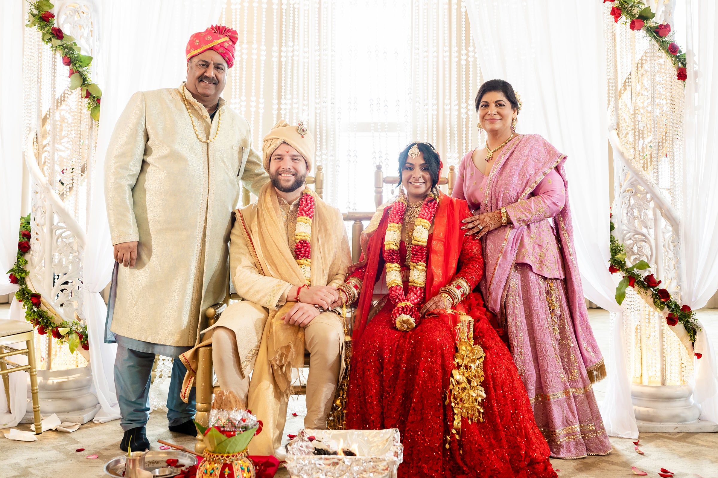 Indian bride and groom with parents