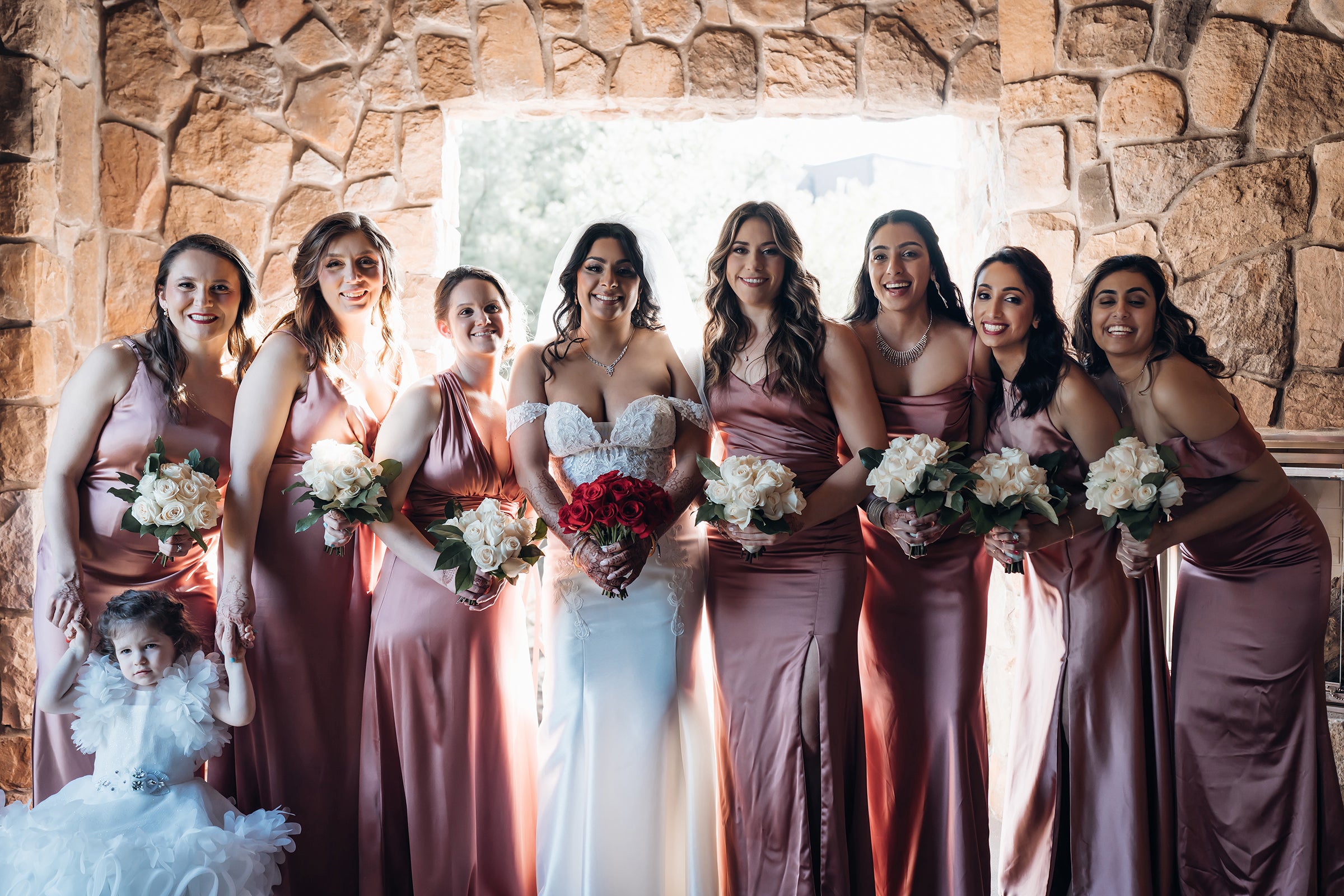 Indian bridesmaids dressed in traditional gowns