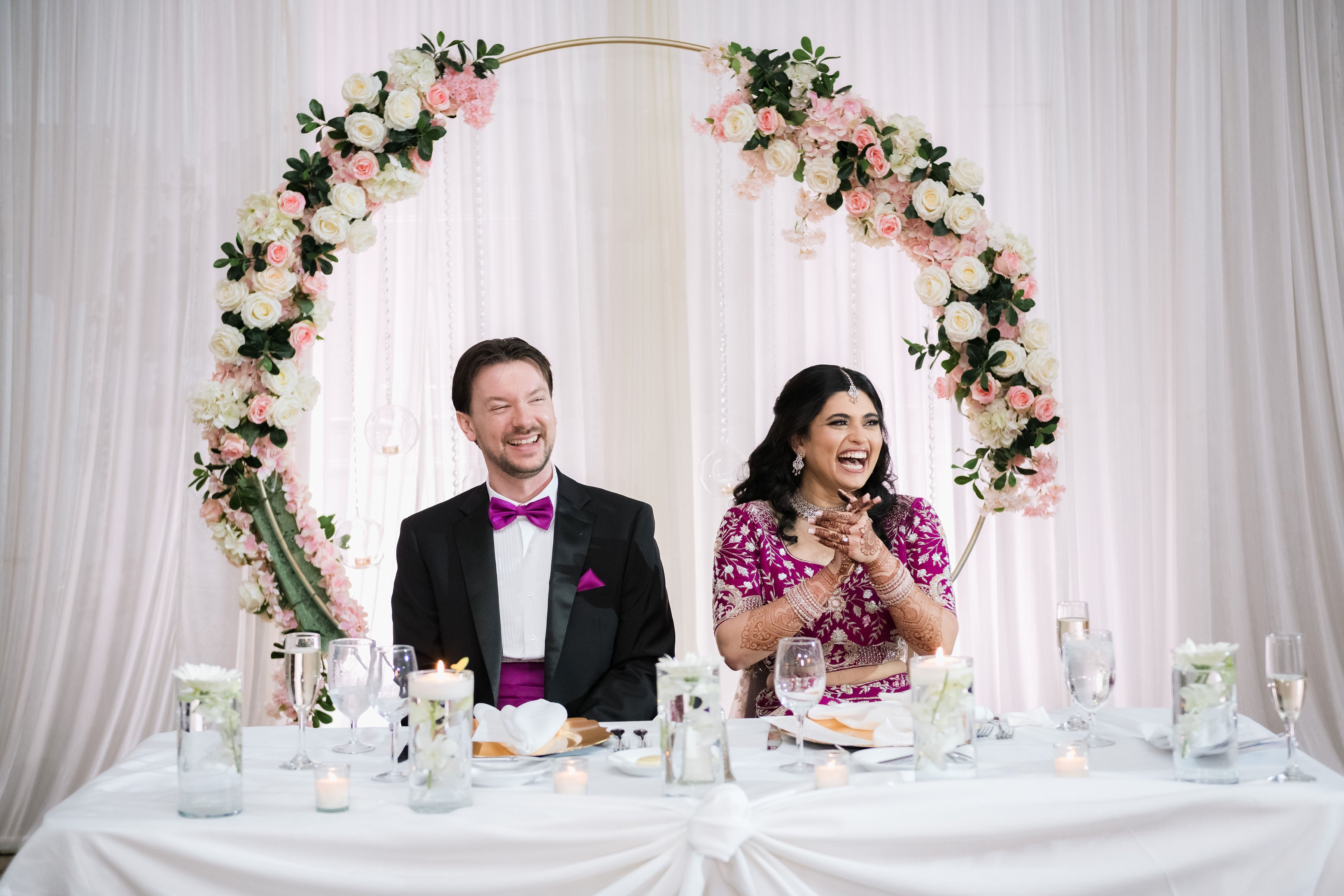 Indian bride and Groom at wedding table