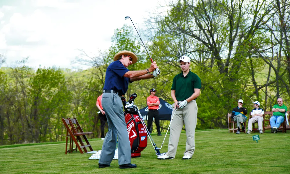 David Leadbetter swinging golf club.